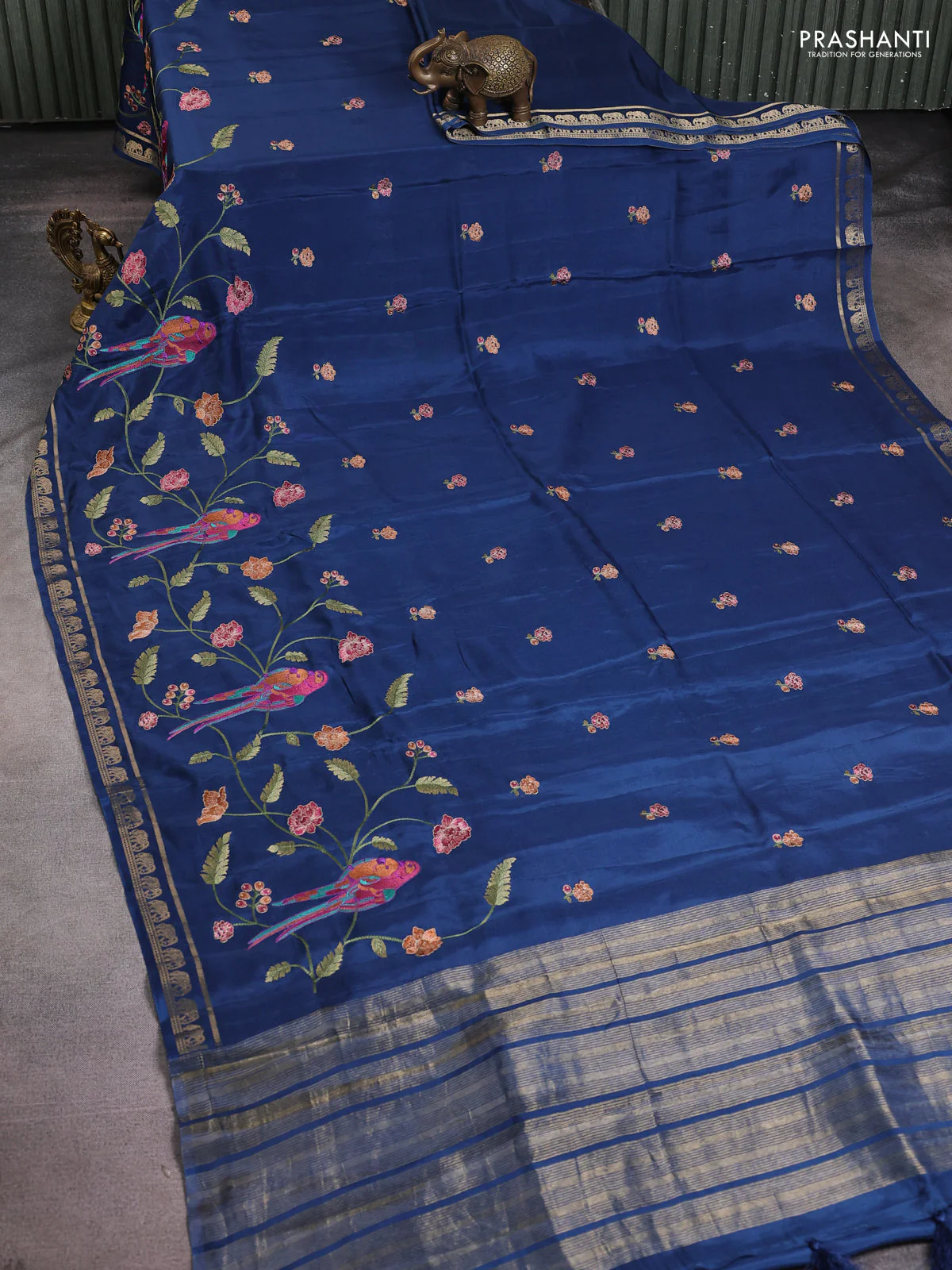 Semi crepe silk saree peacock blue with allover embroidery and elephant zari woven border - Image 2