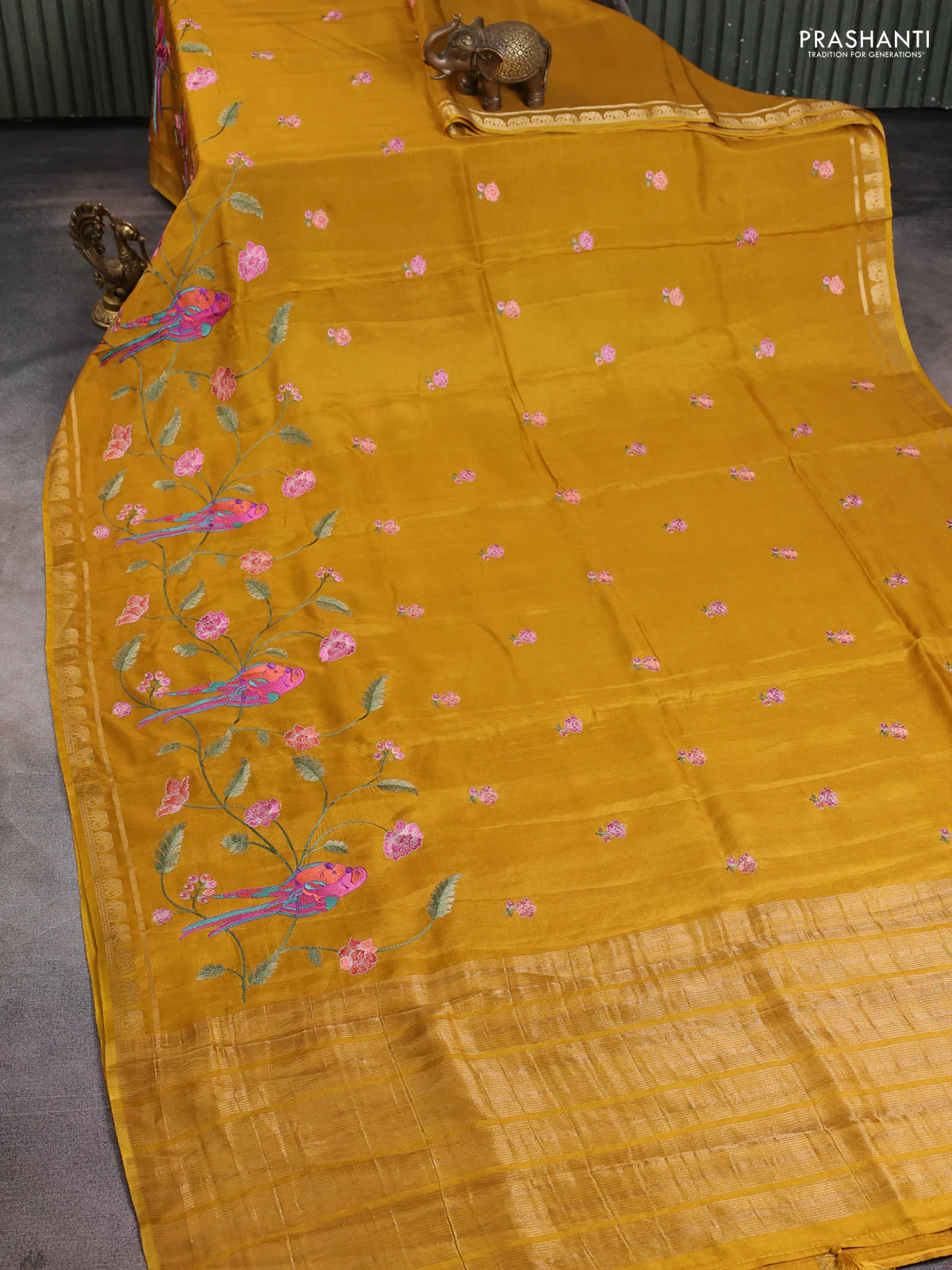 Semi crepe silk saree yellow with allover embroidery and elephant zari woven border - Image 2