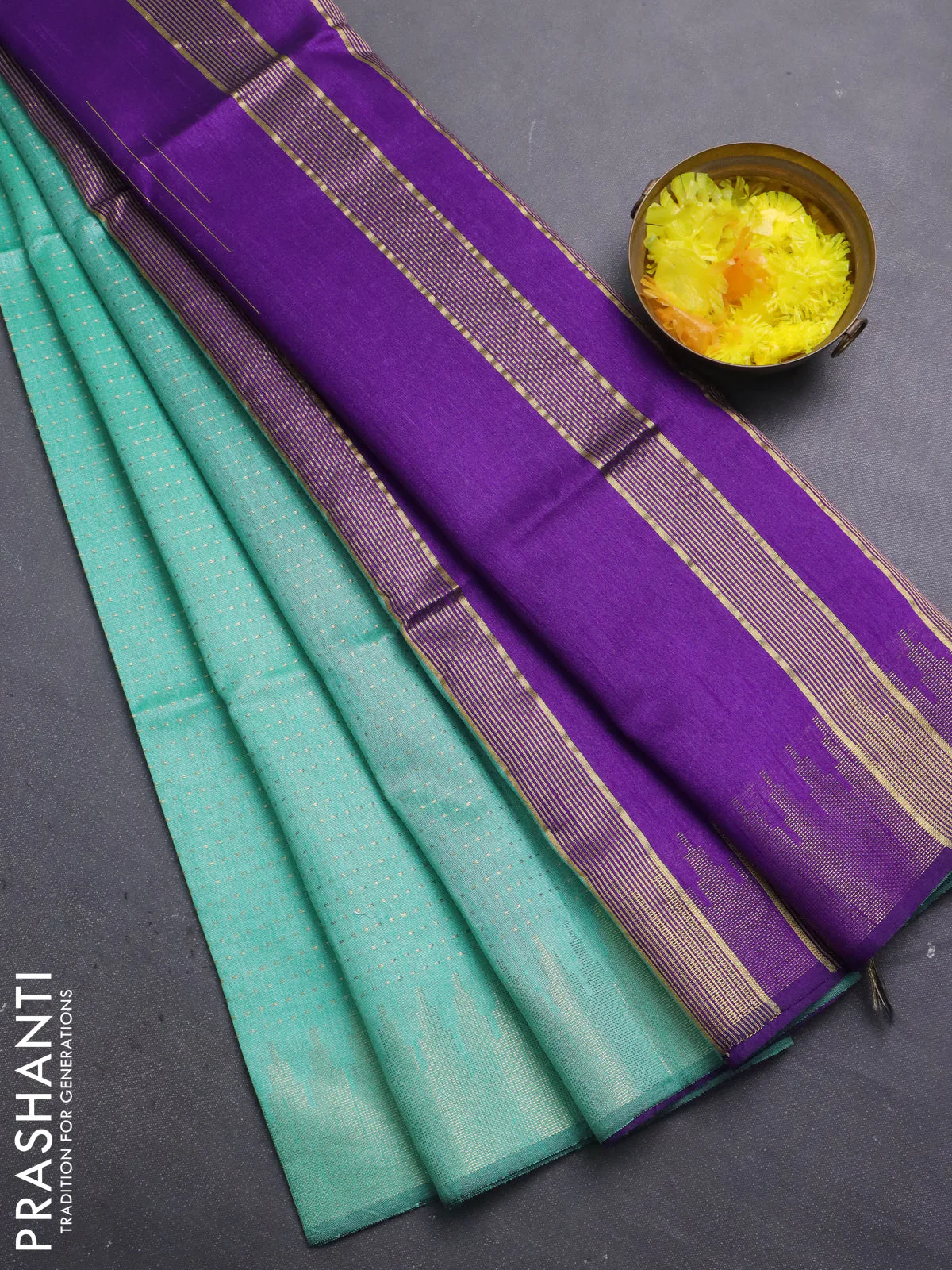 Semi dupion saree teal green and purple with allover zari weaves and temple zari woven border
