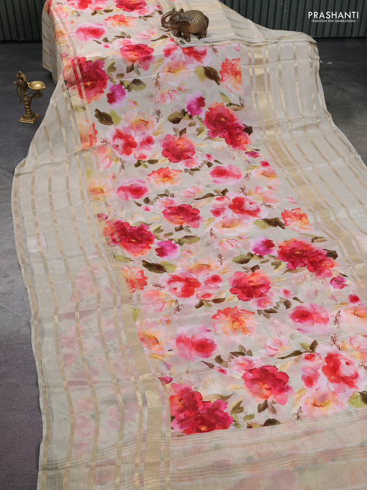 Semi georgette saree beige with allover floral prints and long zari woven border - Image 2