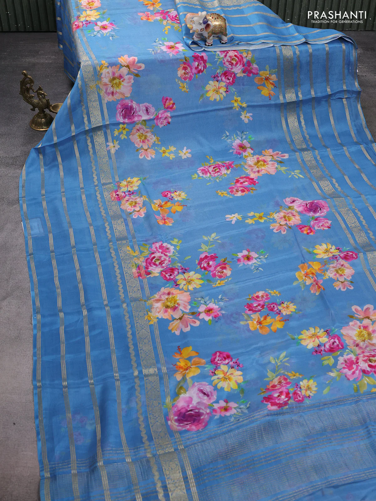 Semi georgette saree blue with allover floral prints and long zari woven border - Image 2