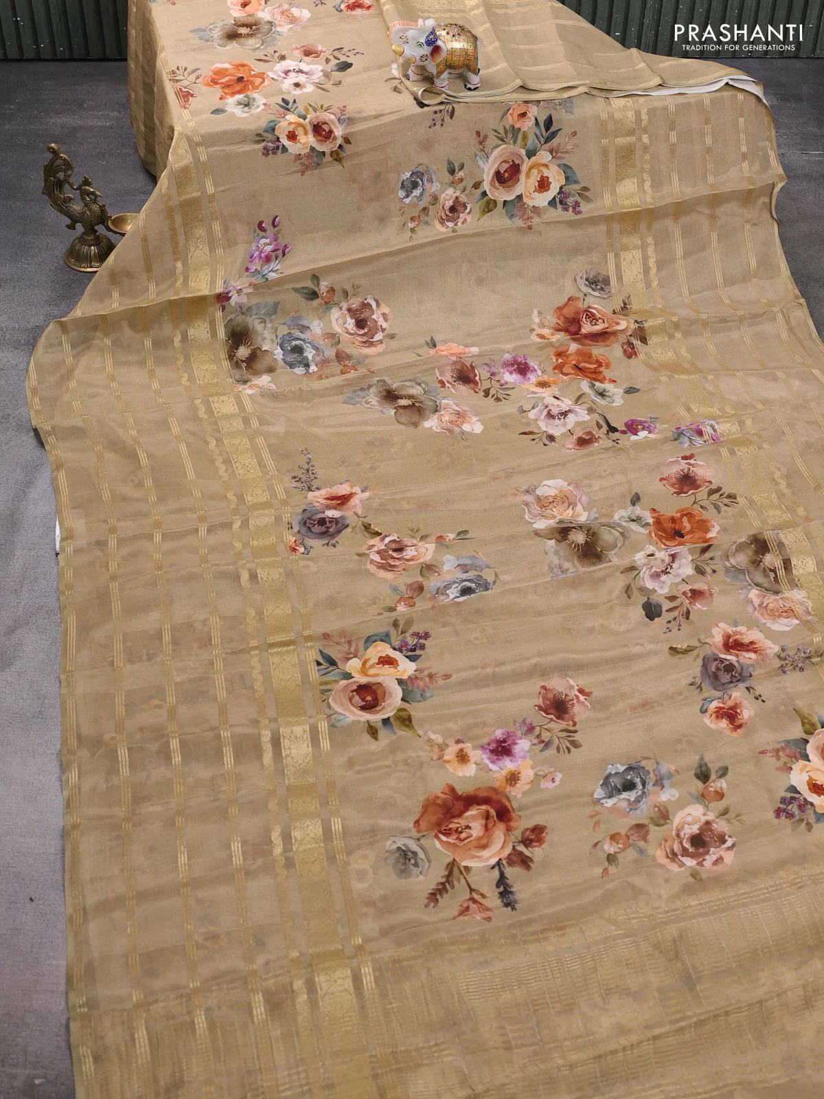 Semi georgette saree elaichi green with allover floral prints and long zari woven border - Image 2
