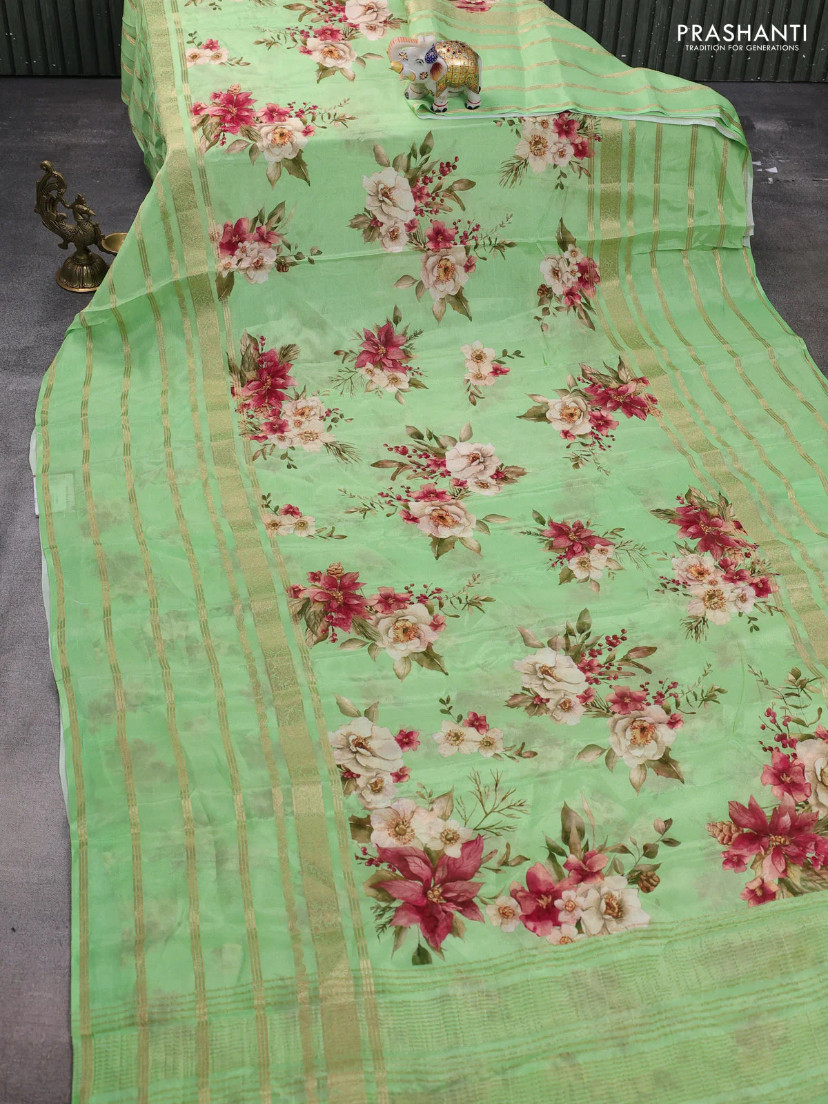 Semi georgette saree green with allover floral prints and long zari woven border - Image 2