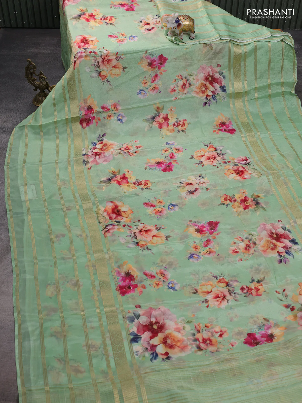 Semi georgette saree green with allover floral prints and long zari woven border - Image 2