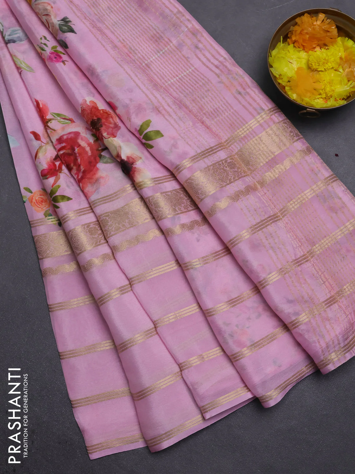 Semi georgette saree light pink with allover floral prints and long zari woven border
