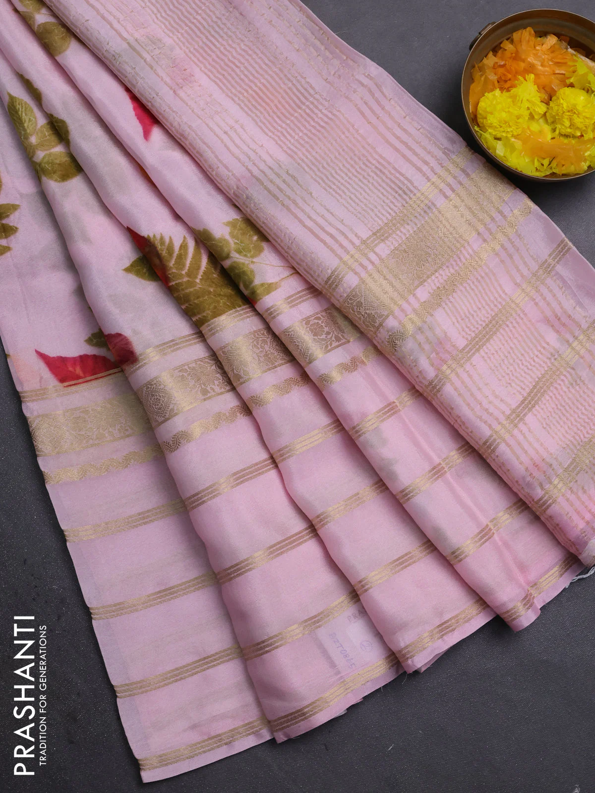 Semi georgette saree light pink with allover floral prints and long zari woven border