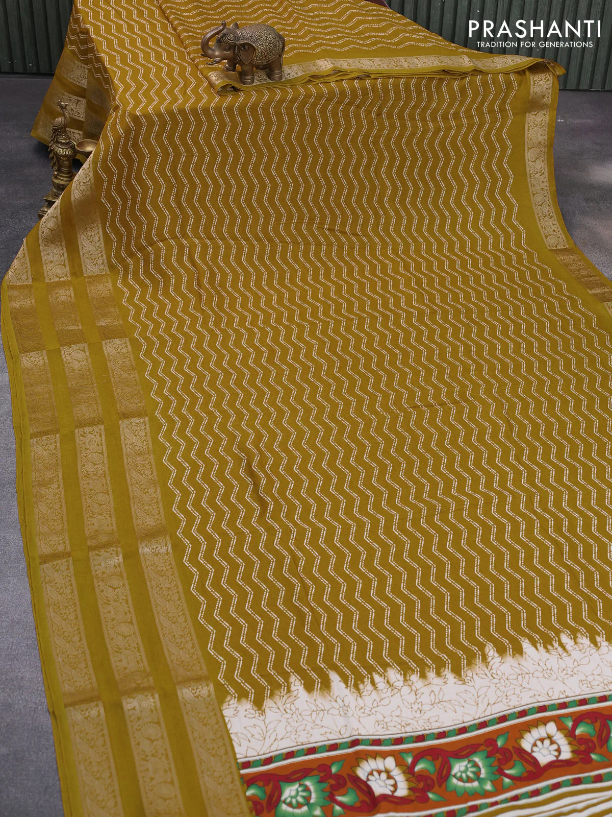 Semi georgette saree mustard yellow with allover zig zag prints and long zari woven border - Image 2