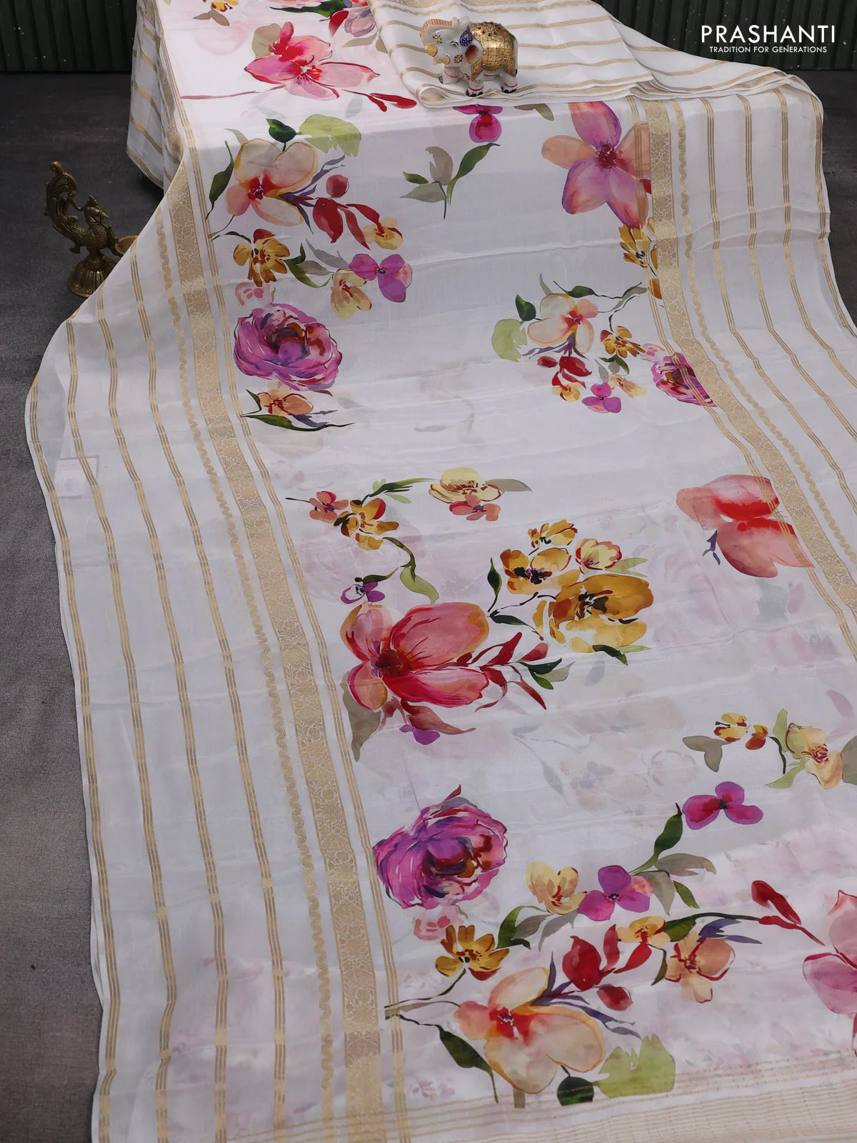 Semi georgette saree off white with allover floral prints and long zari woven border - Image 2
