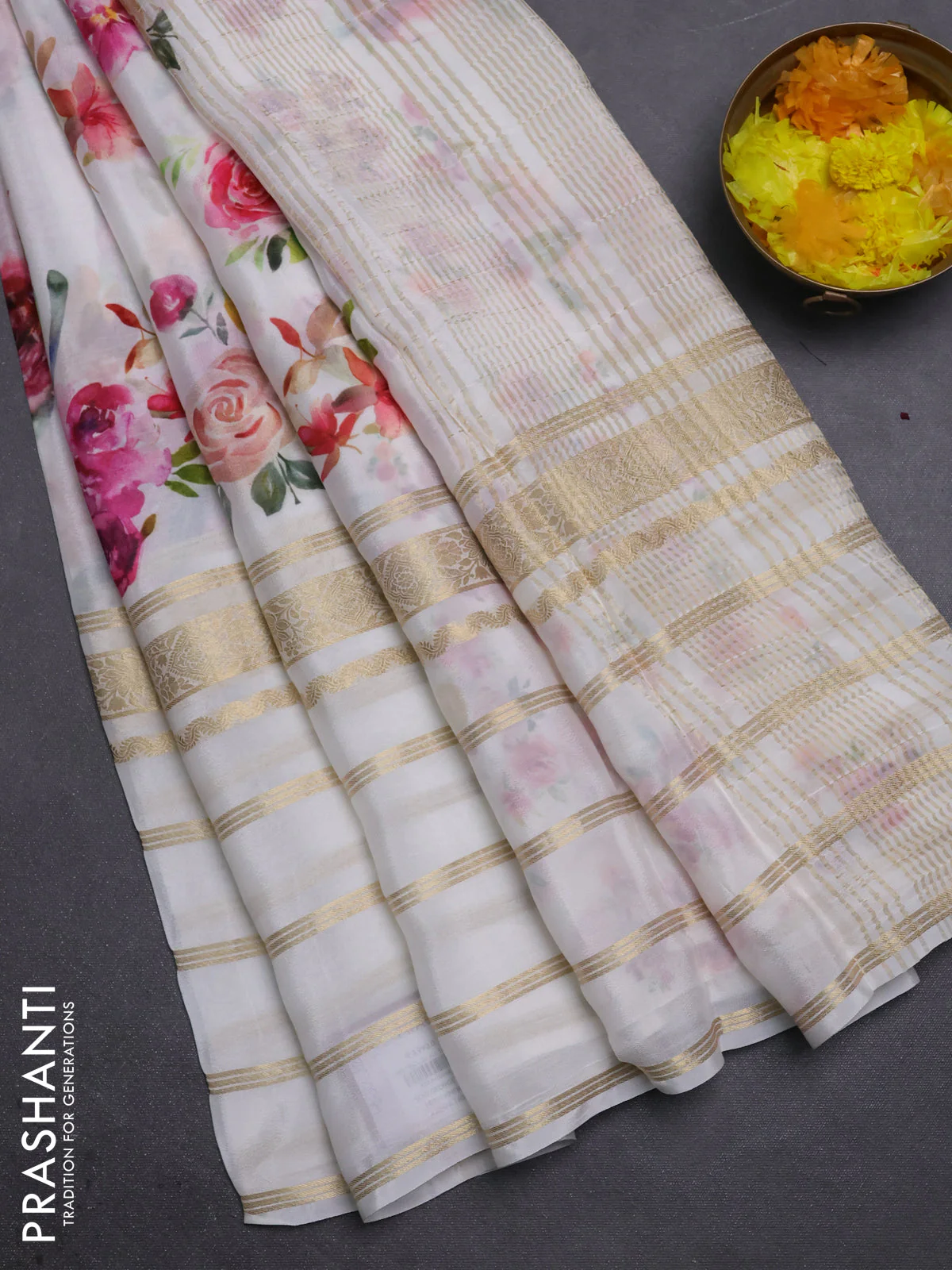 Semi georgette saree off white with allover floral prints and long zari woven border