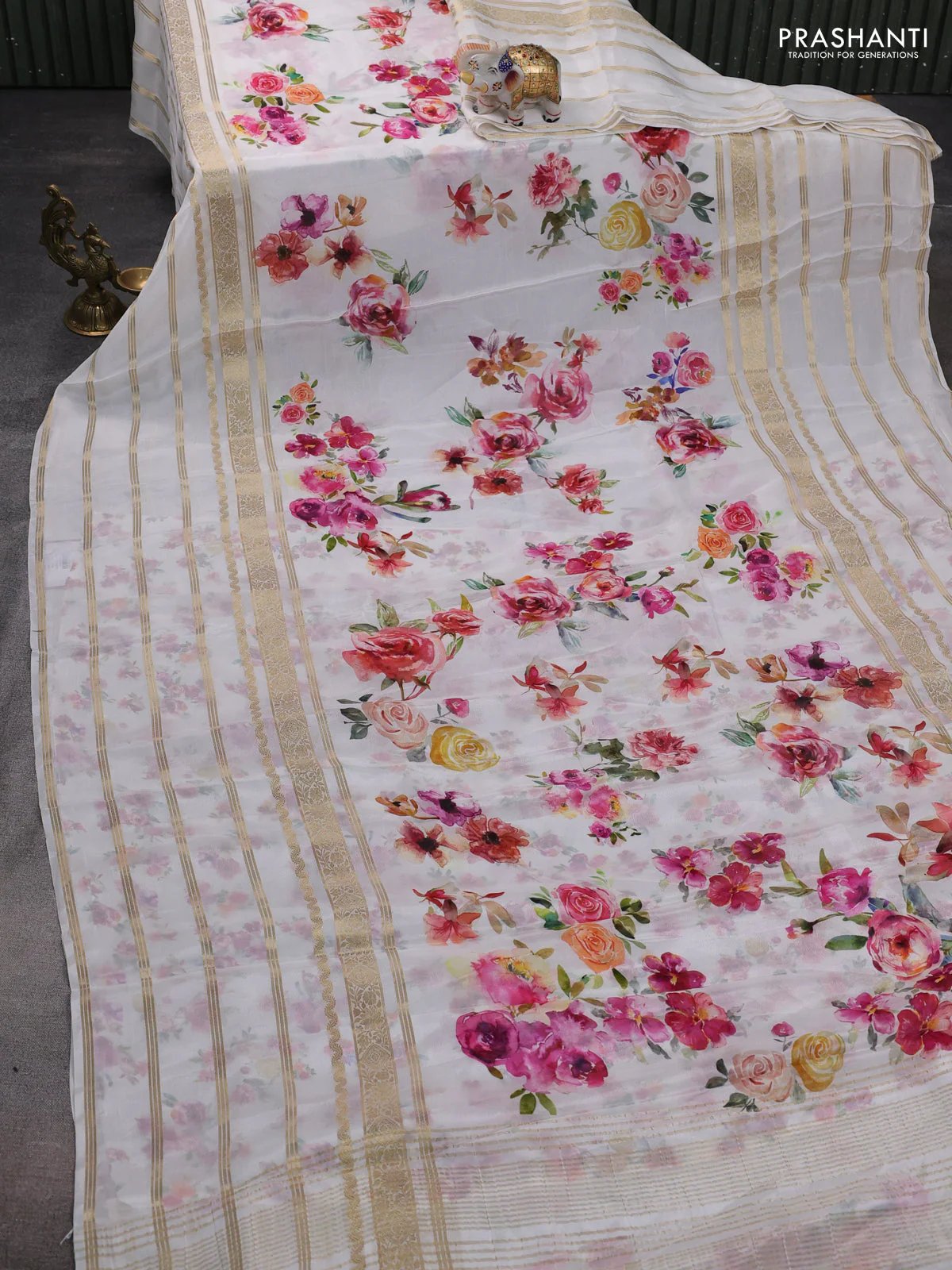 Semi georgette saree off white with allover floral prints and long zari woven border - Image 2