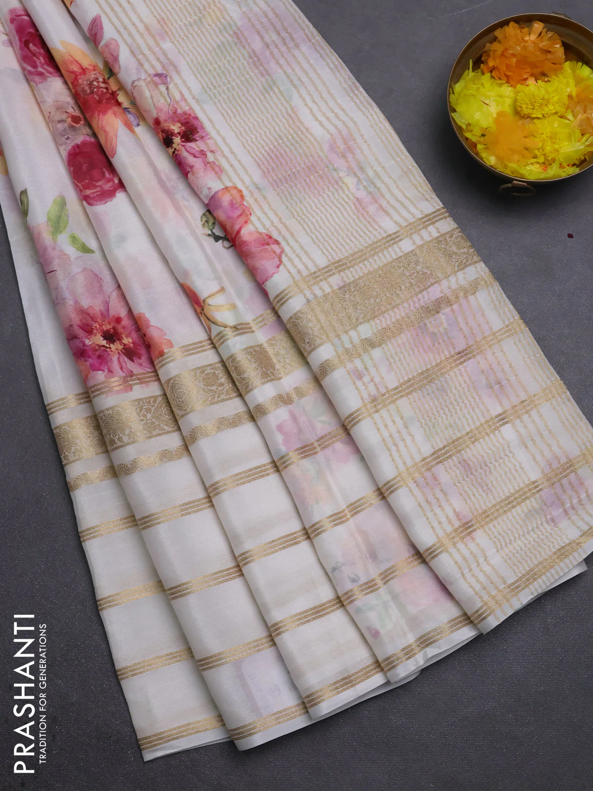 Semi georgette saree off white with allover floral prints and long zari woven border