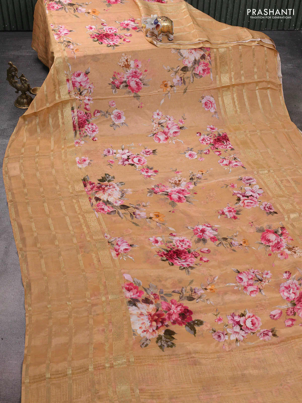 Semi georgette saree orange shade with allover floral prints and long zari woven border - Image 2