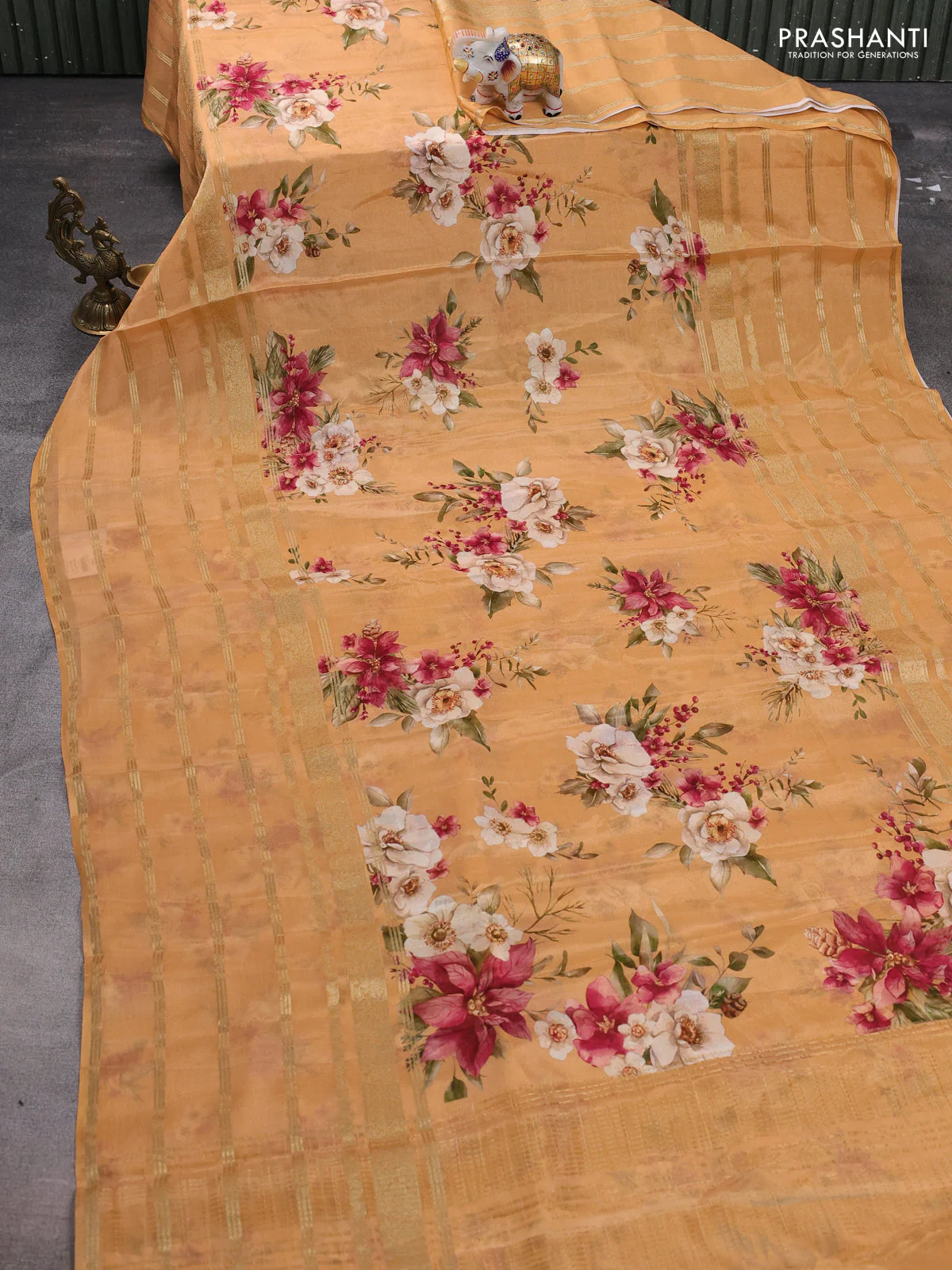 Semi georgette saree orange with allover floral prints and long zari woven border - Image 2