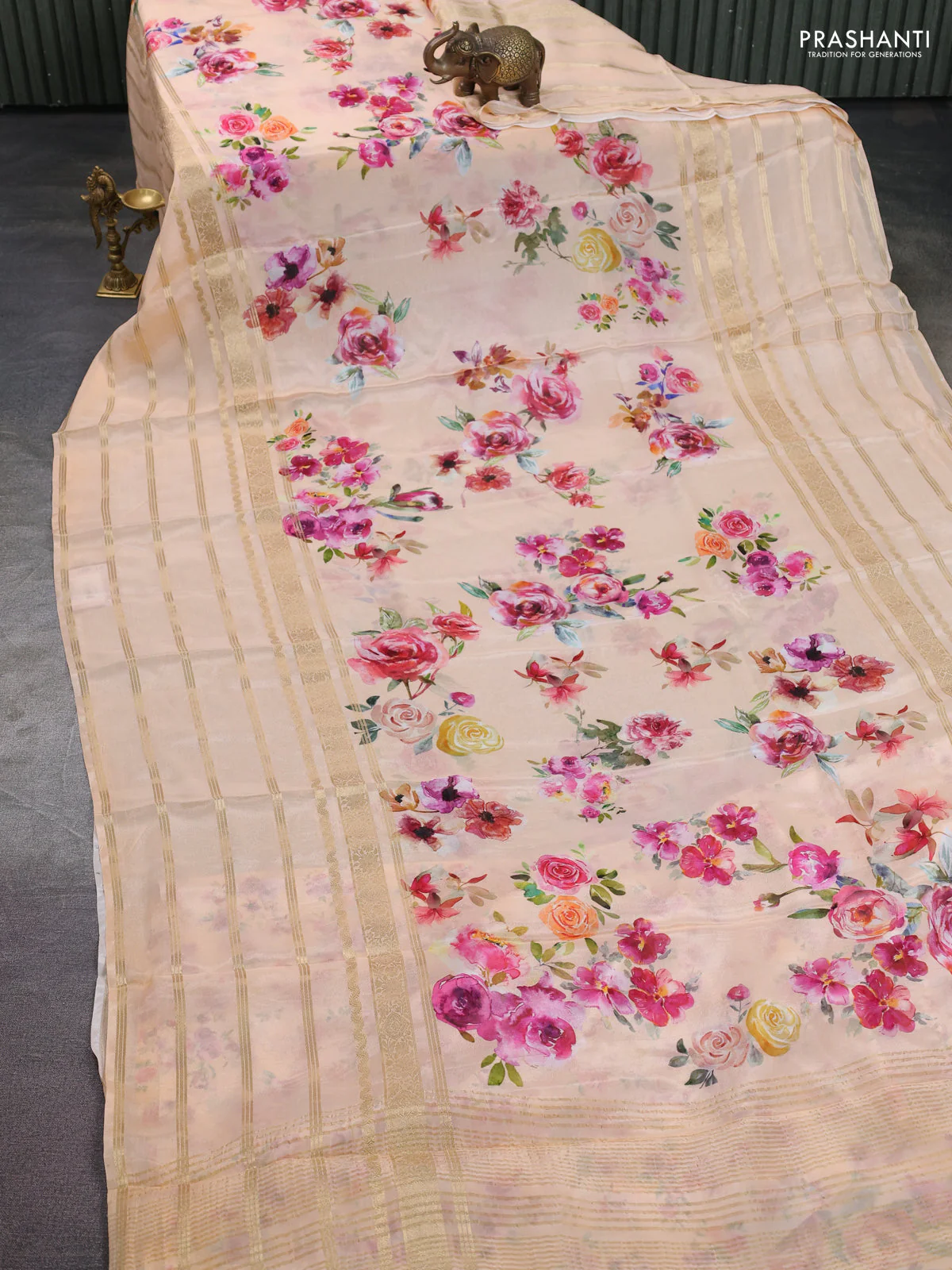 Semi georgette saree pale orange with allover floral prints and long zari woven border - Image 2