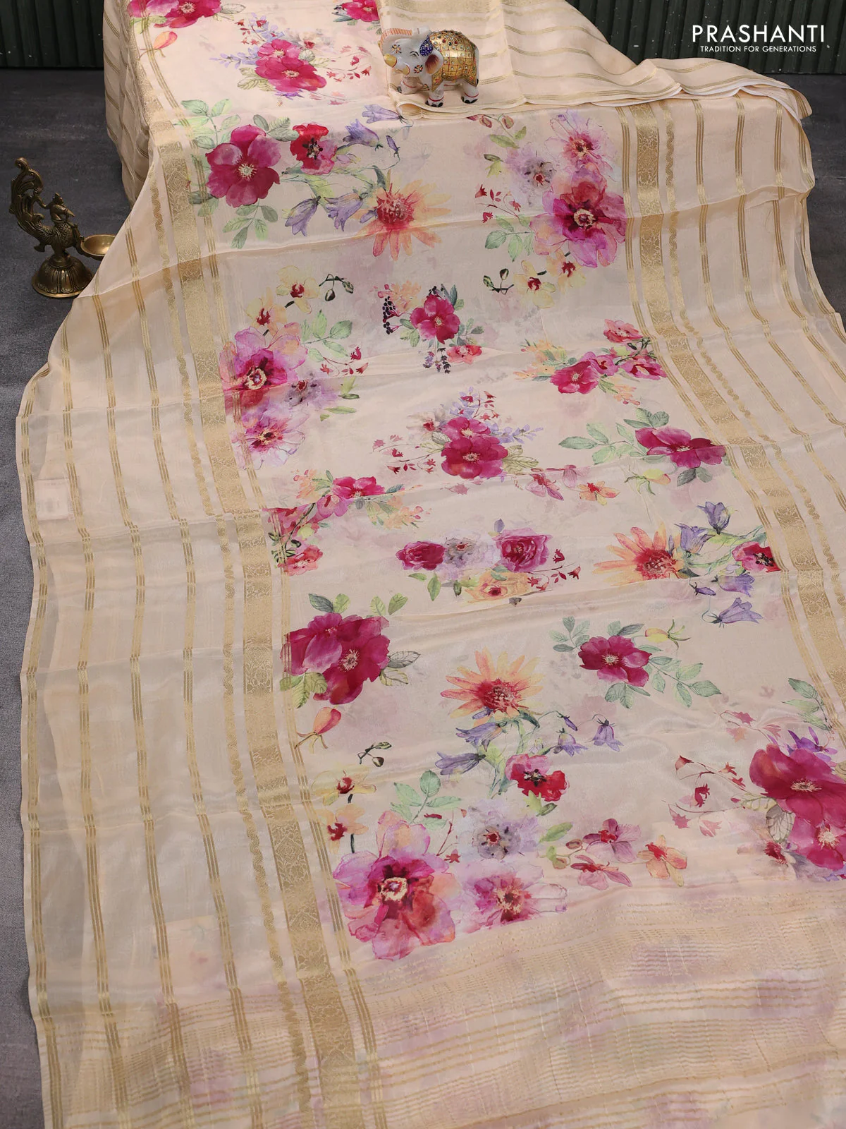 Semi georgette saree pale orange with allover floral prints and long zari woven border - Image 2
