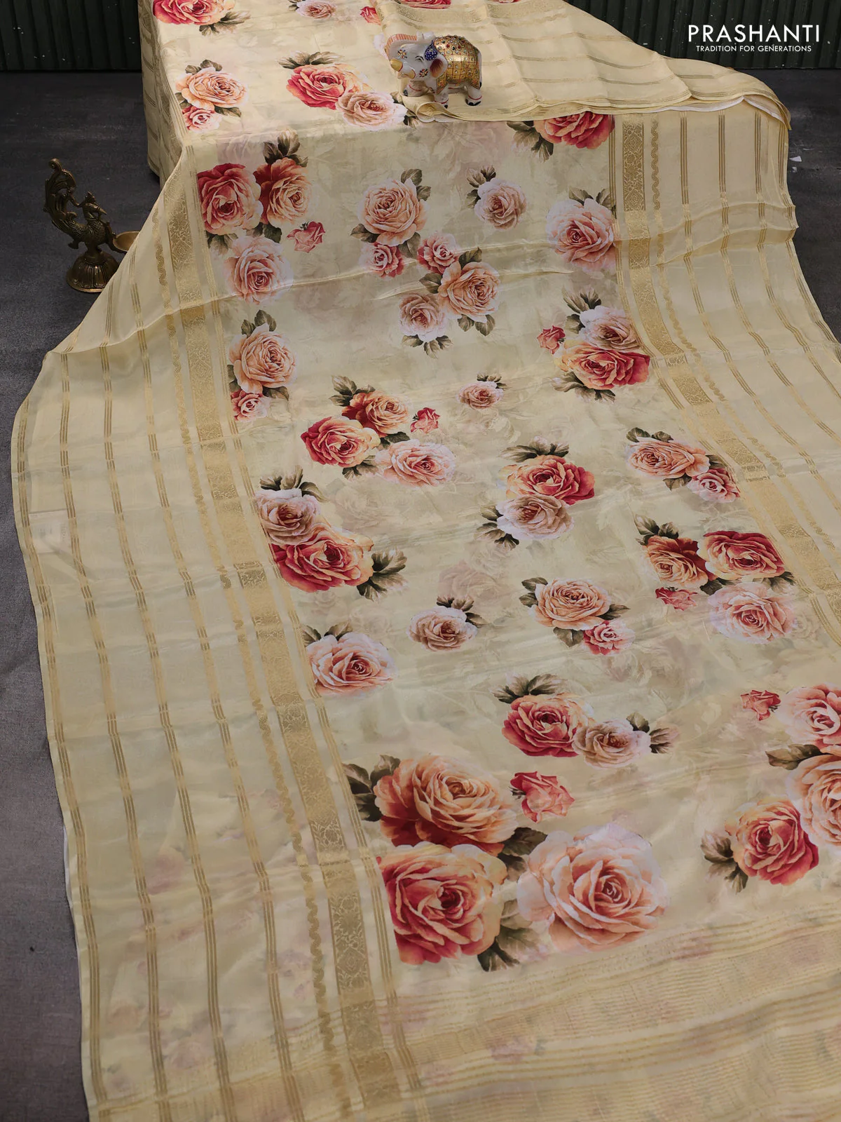 Semi georgette saree pale yellow with allover floral prints and long zari woven border - Image 2