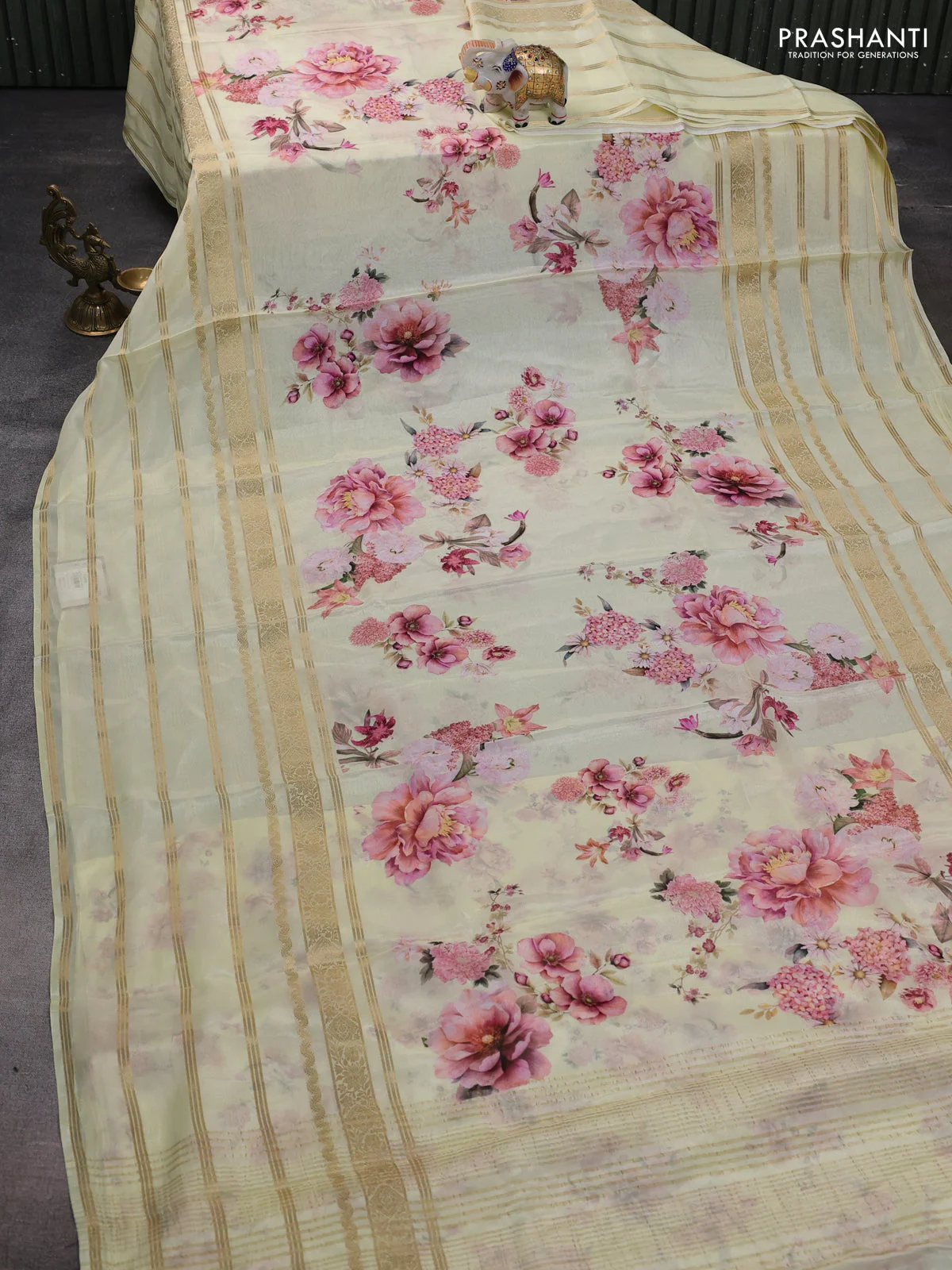 Semi georgette saree pale yellow with allover floral prints and long zari woven border - Image 2