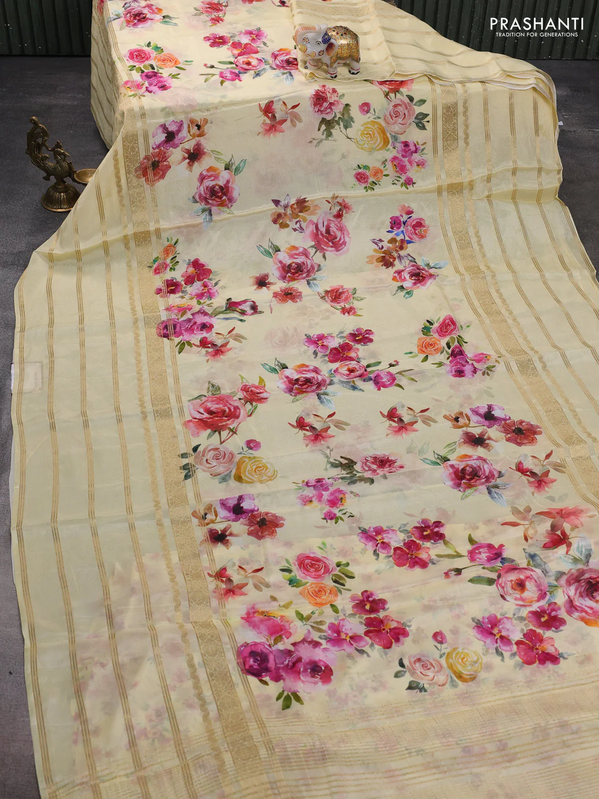 Semi georgette saree pale yellow with allover floral prints and long zari woven border - Image 2