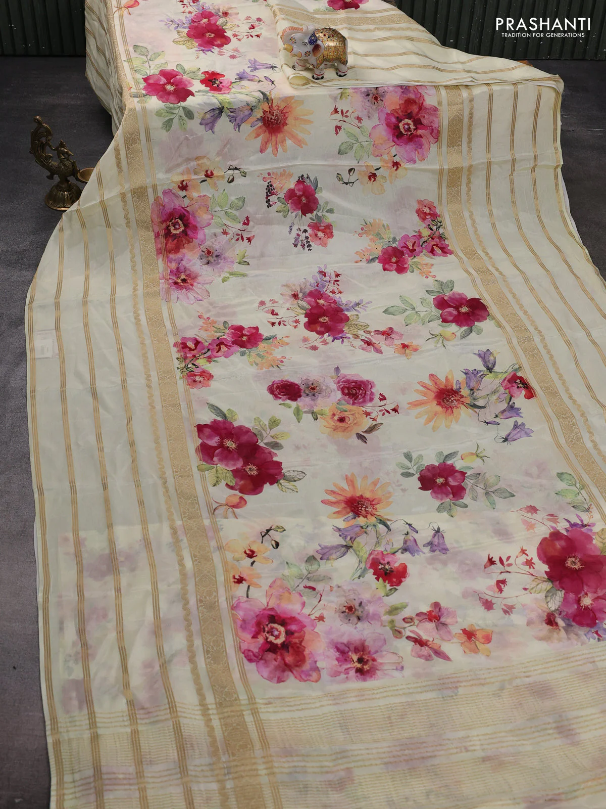 Semi georgette saree pale yellow with allover floral prints and long zari woven border - Image 2