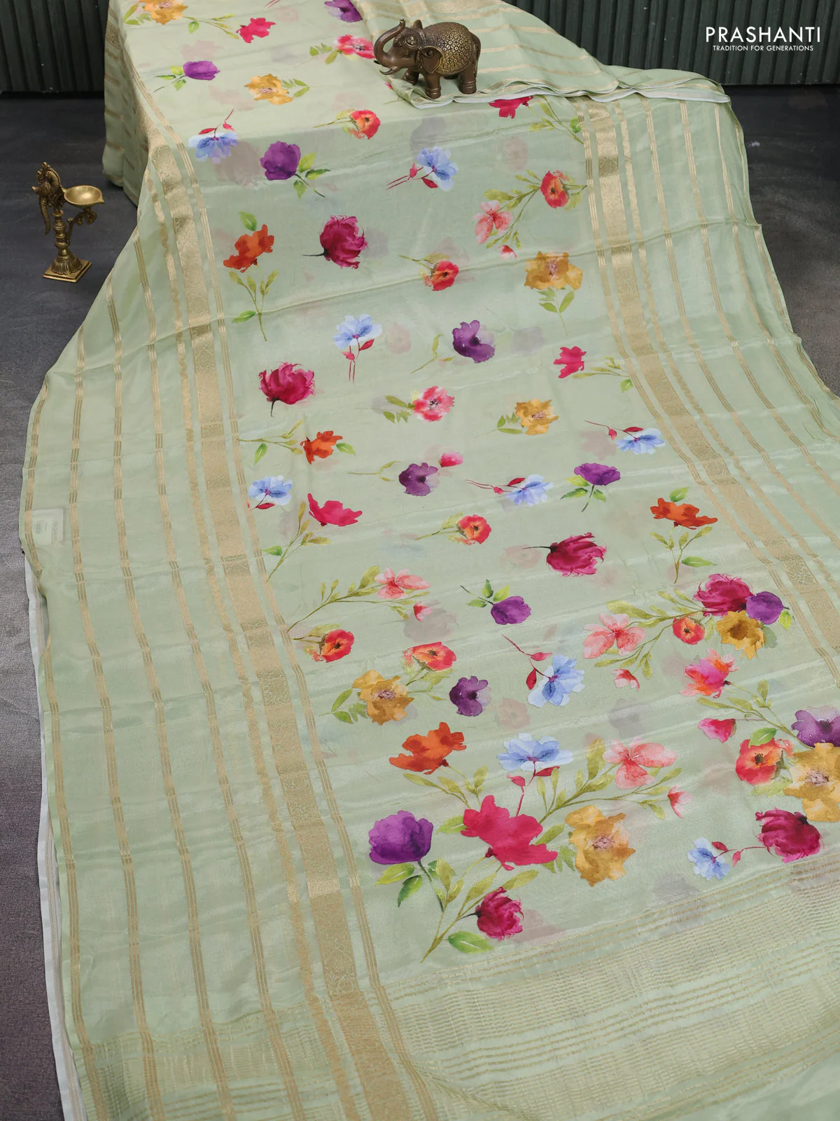 Semi georgette saree pastel green with allover floral prints and long zari woven border - Image 2