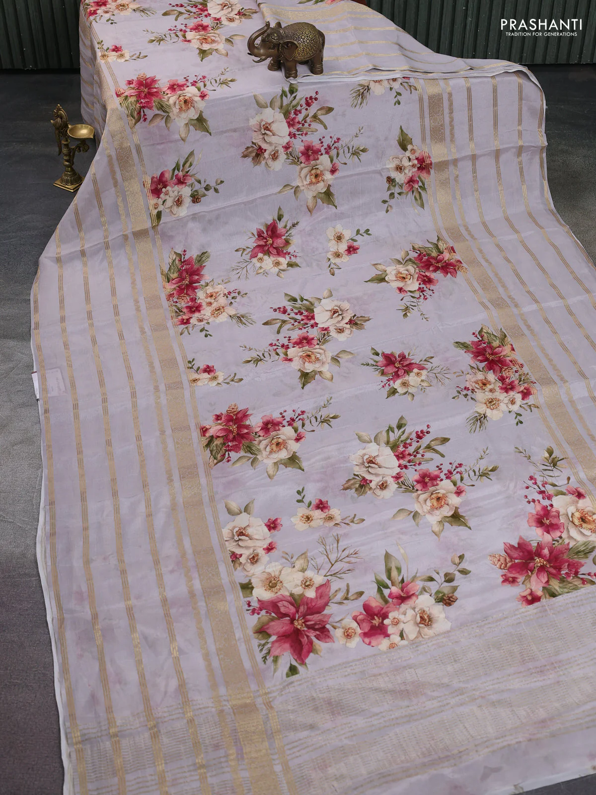 Semi georgette saree pastel grey with allover floral prints and long zari woven border - Image 2