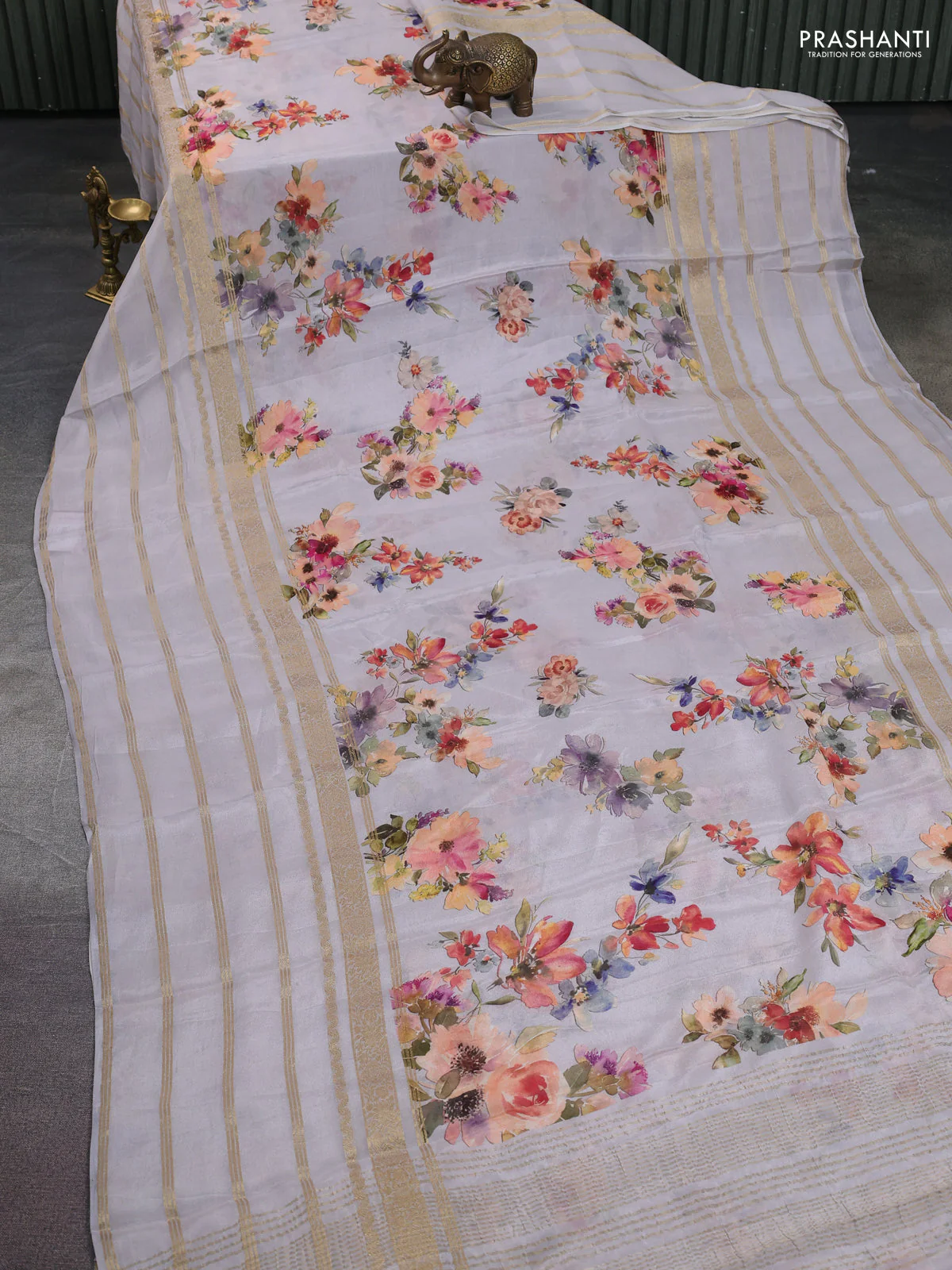 Semi georgette saree pastel grey with allover floral prints and long zari woven border - Image 2