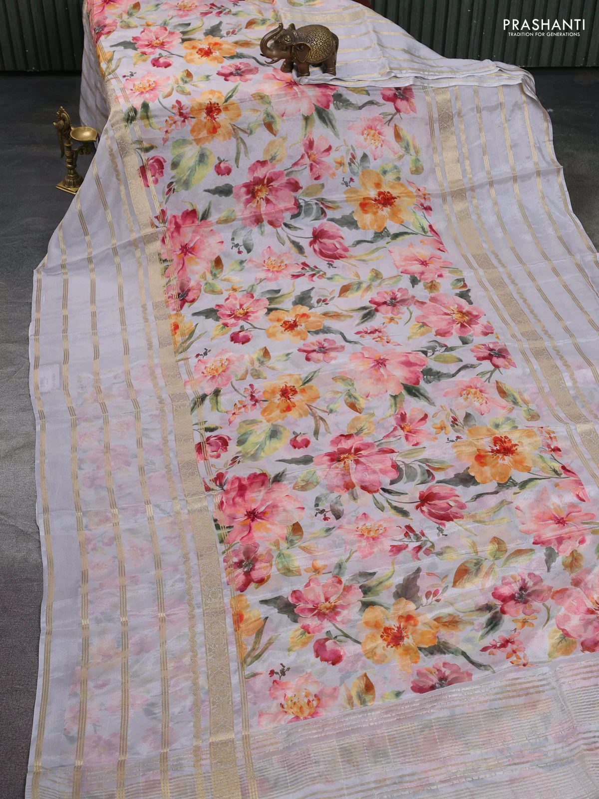 Semi georgette saree pastel grey with allover floral prints and long zari woven border - Image 2