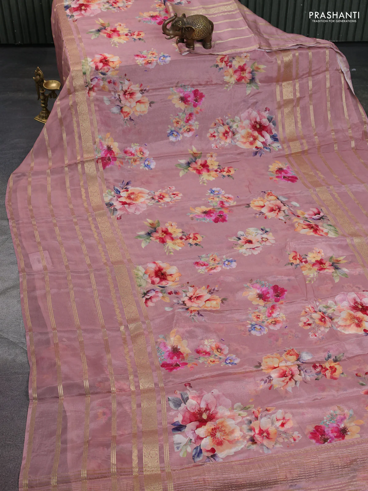 Semi georgette saree pastel peach shade with allover floral prints and long zari woven border - Image 2