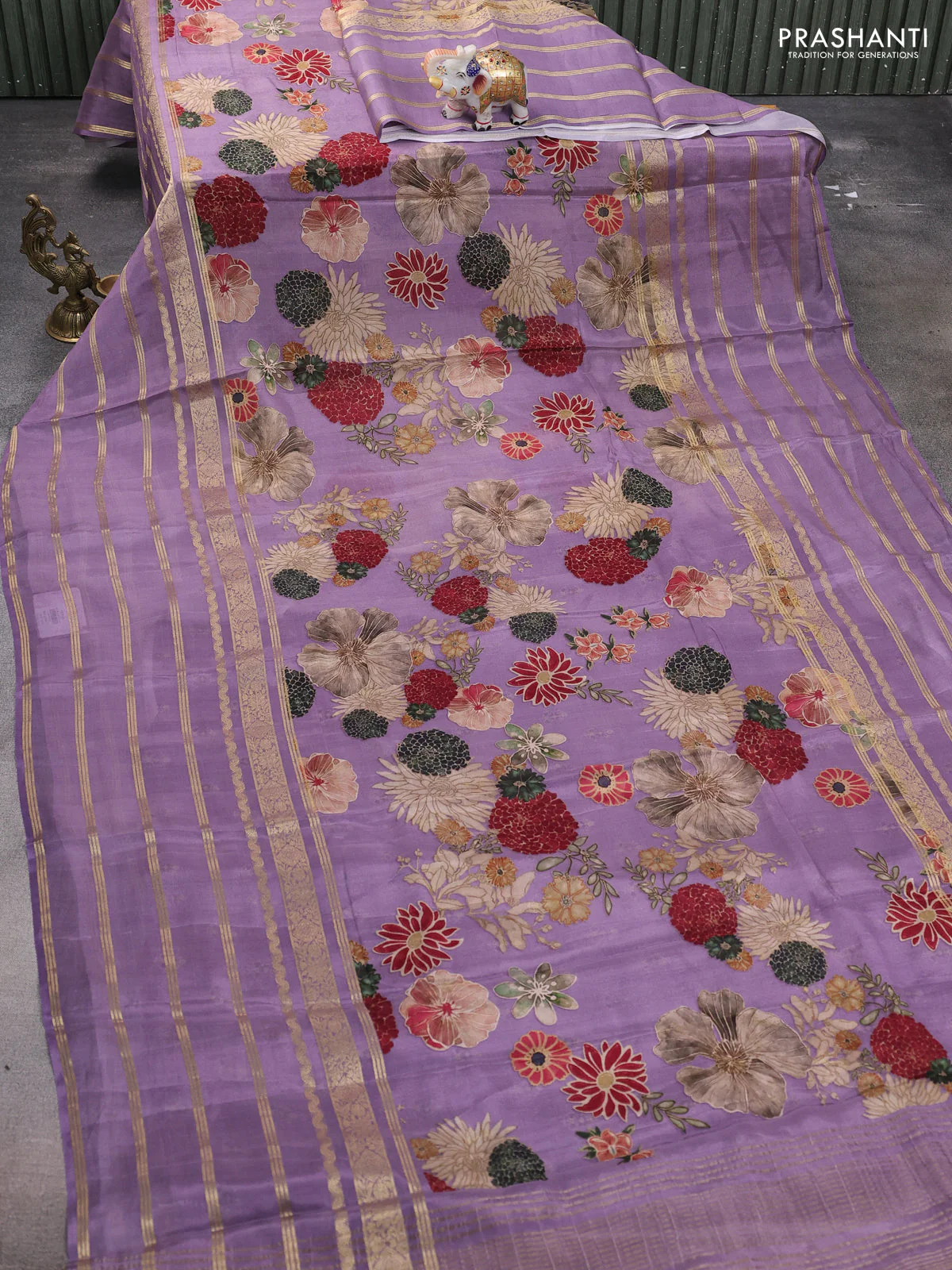Semi georgette saree pastel purple with allover floral prints and long zari woven border - Image 2