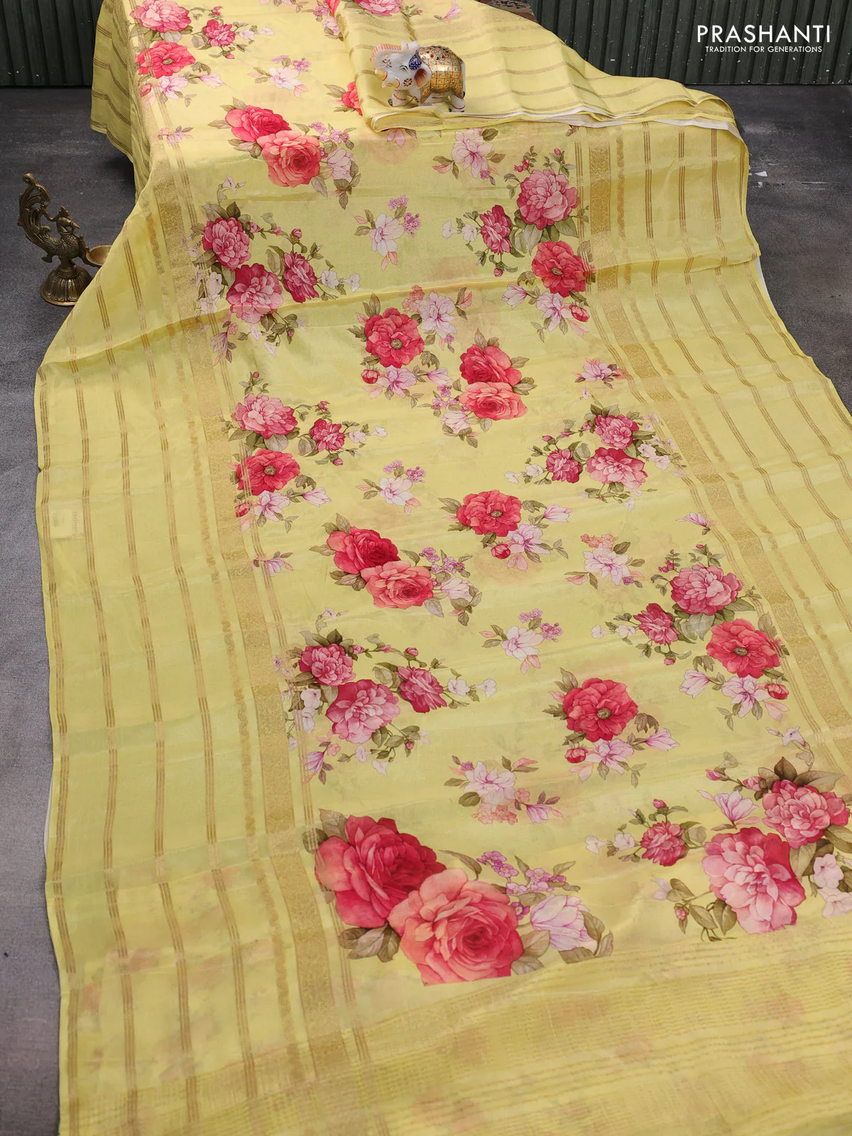 Semi georgette saree yellow with allover floral prints and long zari woven border - Image 2