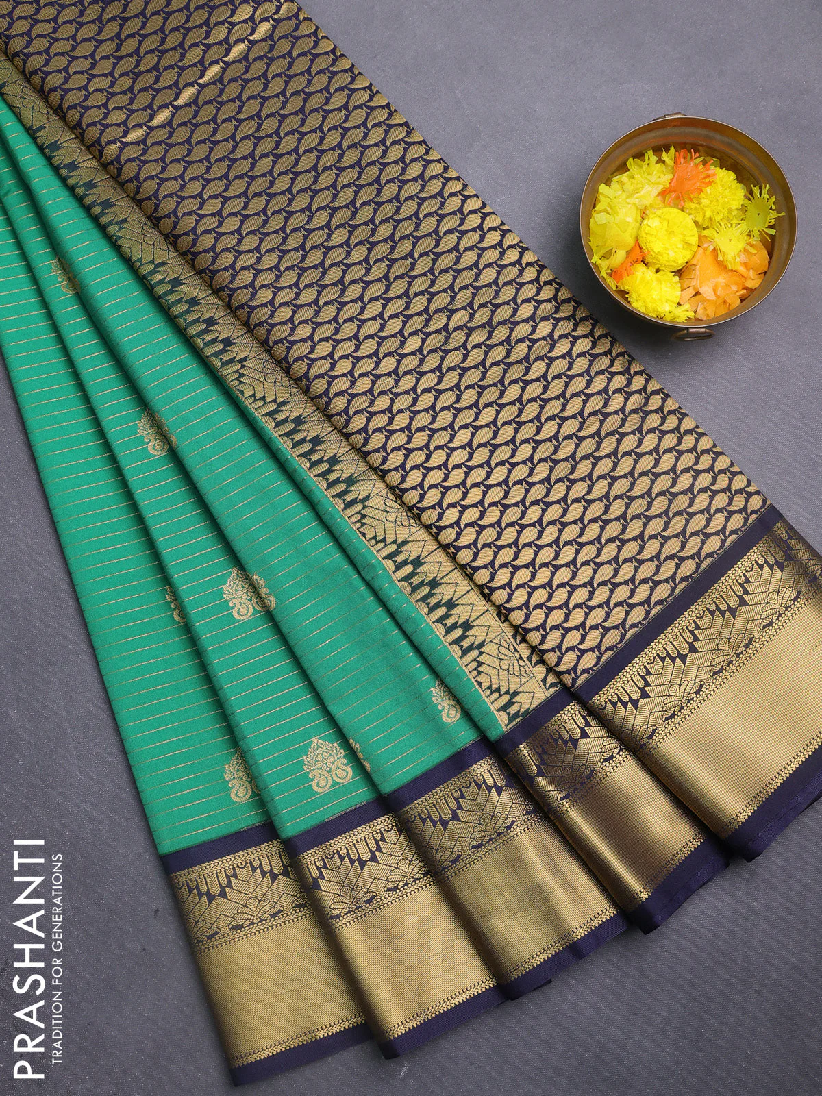 Semi kanchipuram silk saree green and blue with allover zari weaves & buttas and rich zari woven korvai border