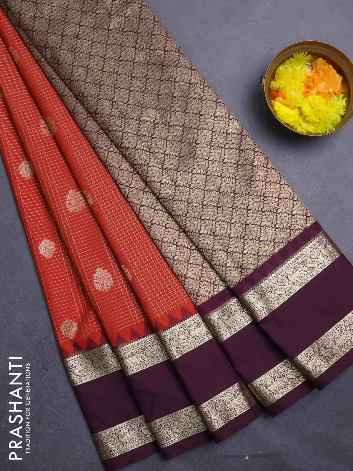 Semi kanchipuram silk saree rustic orange and wine shade with allover zari checks & buttas and temple design rettapet zari woven border