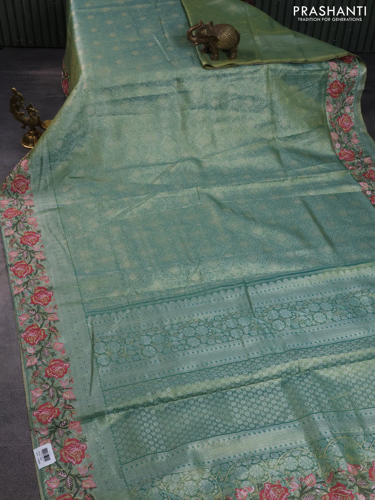 Semi kanchipuram tissue silk saree green shade with allover zari woven brocade weaves and floral design embroidery border - Image 2