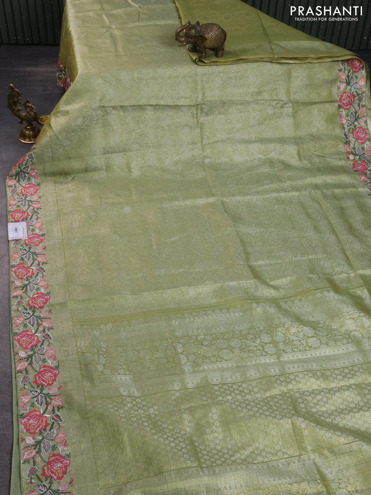 Semi kanchipuram tissue silk saree lime green with allover zari woven brocade weaves and floral design embroidery border - Image 2