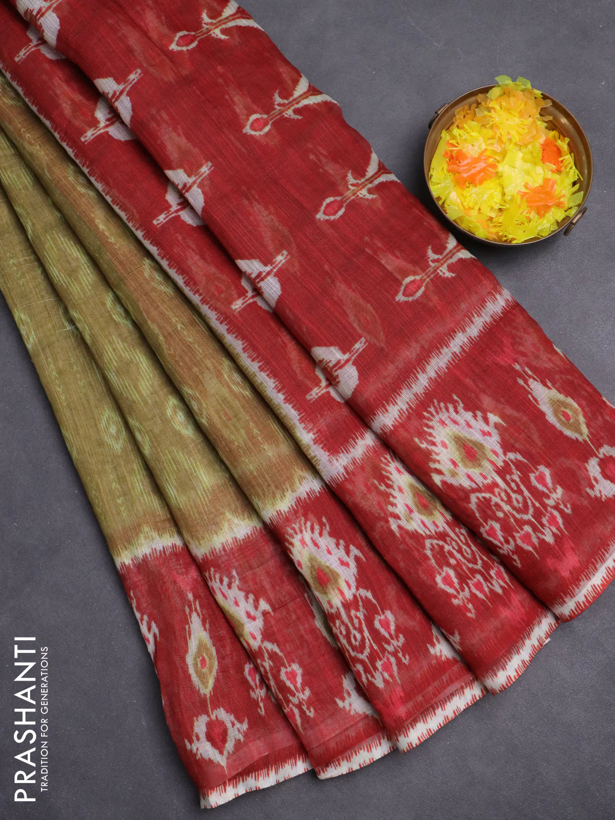 Semi linen saree mustard green and red with allover ikat prints and long printed border