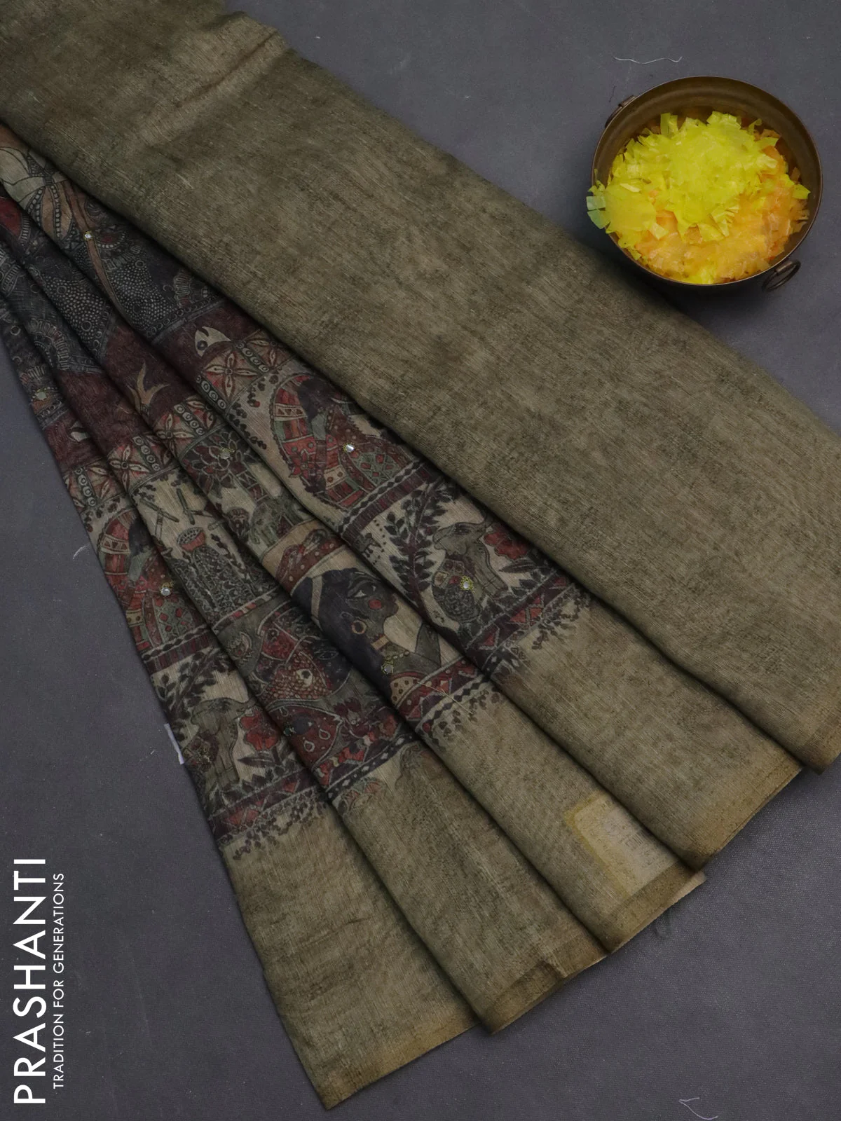 Semi linen saree pista green shade with allover madhubani prints & mirror work
