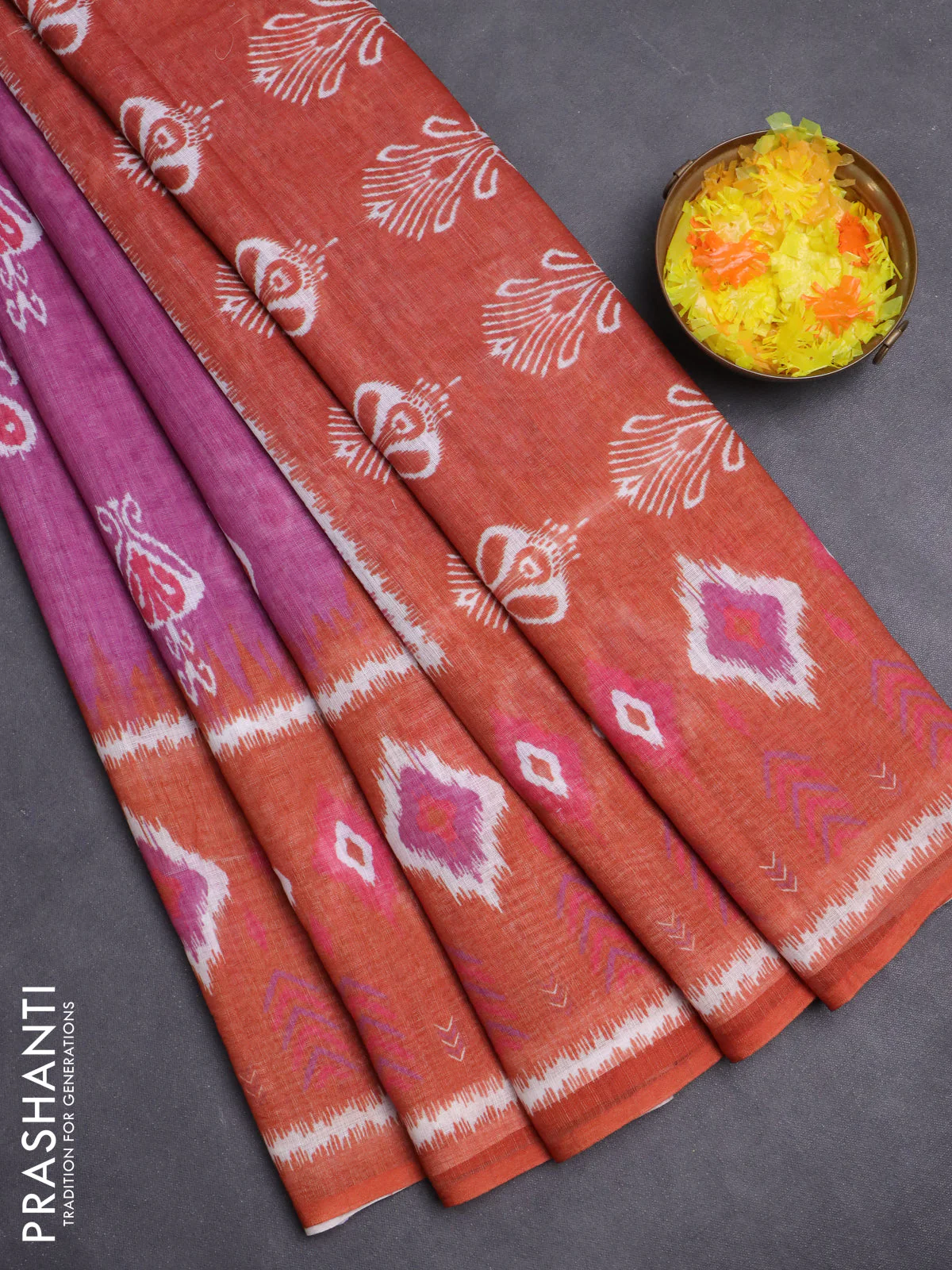Semi linen saree purple and rust shade with allover ikat butta prints and long printed border