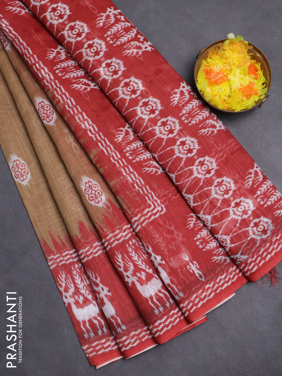 Semi linen saree sandal and rustic orange with allover ikat butta prints and long printed border