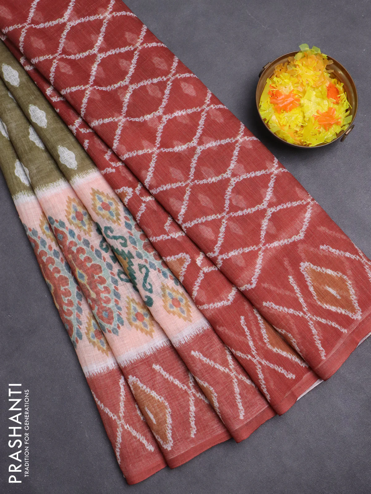 Semi linen saree sap green and rust shade with allover ikat butta prints and printed border