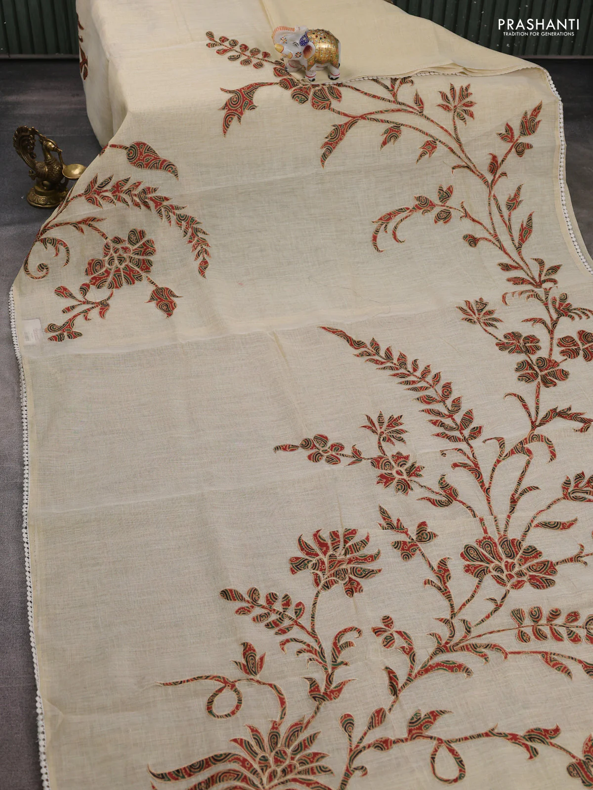 Semi linen tissue saree cream and rustic orange with applique work and crocia lace work border - Image 2