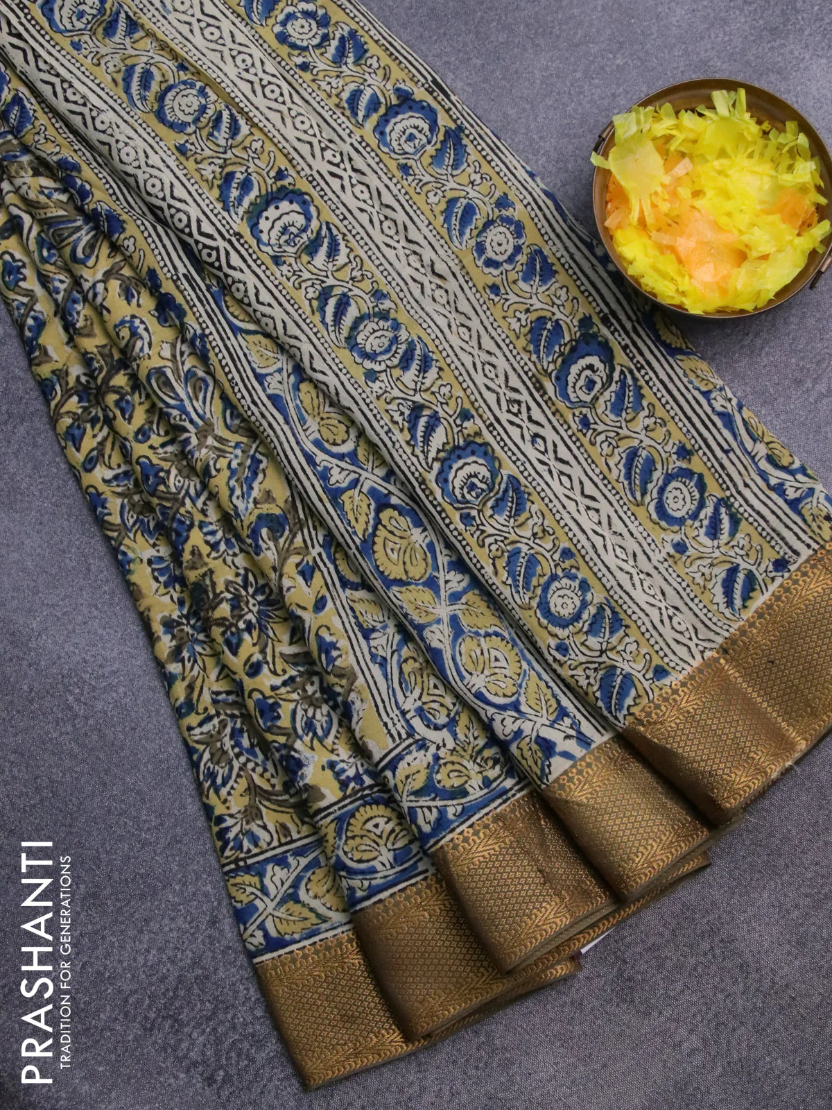 Semi mangalgiri silk saree yellow and mehendi green with allover kalamkari block prints and zari woven border