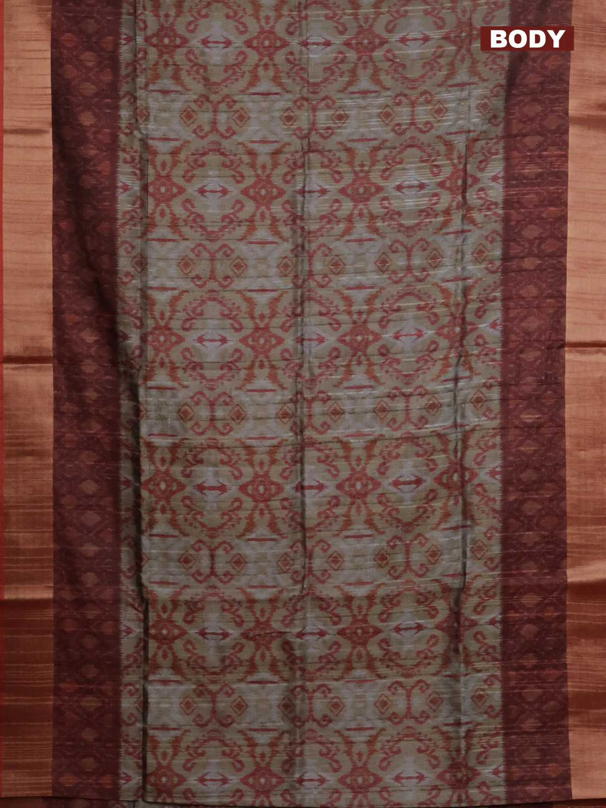 Semi matka saree chikku shade and rust shade with allover ikat prints and zari woven border - Image 2