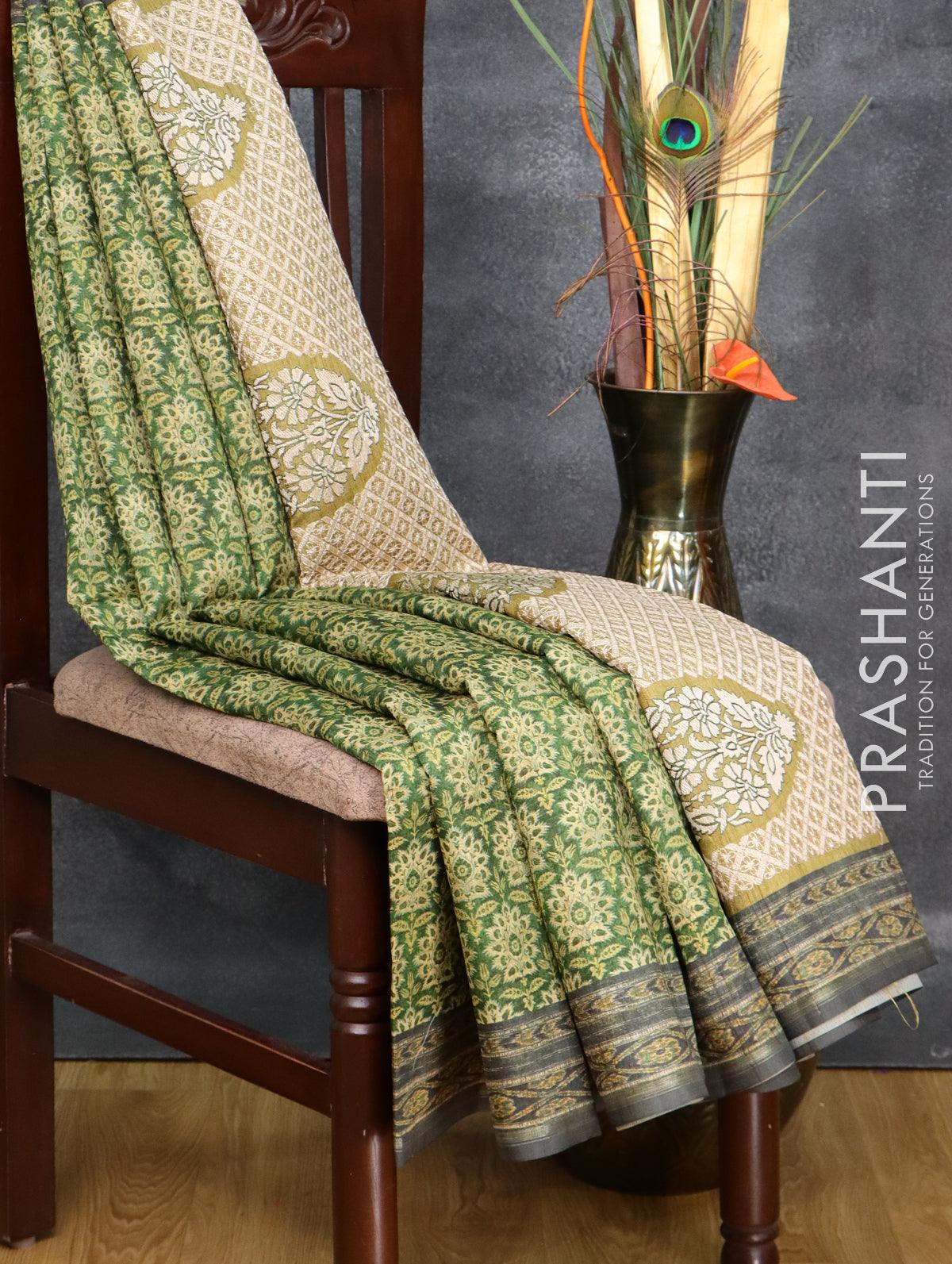 Semi matka saree green and dark grey with allover floral butta prints and printed border - Image 3