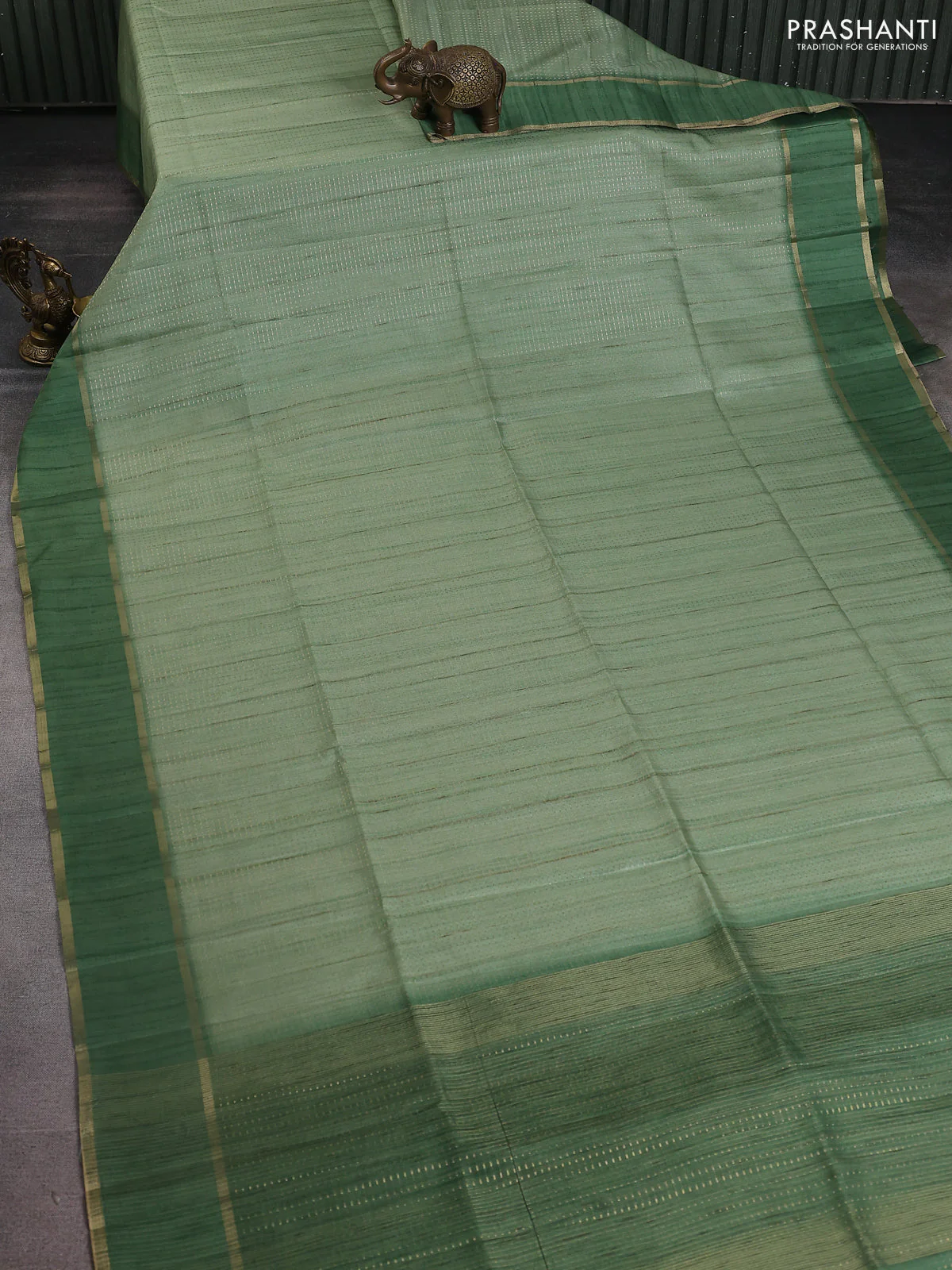 Semi matka saree light green with allover zari weaves and rettapet zari woven border - Image 2