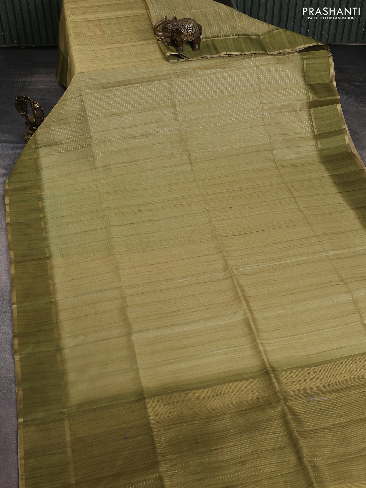 Semi matka saree mehendi green with allover zari weaves and rettapet zari woven border - Image 2