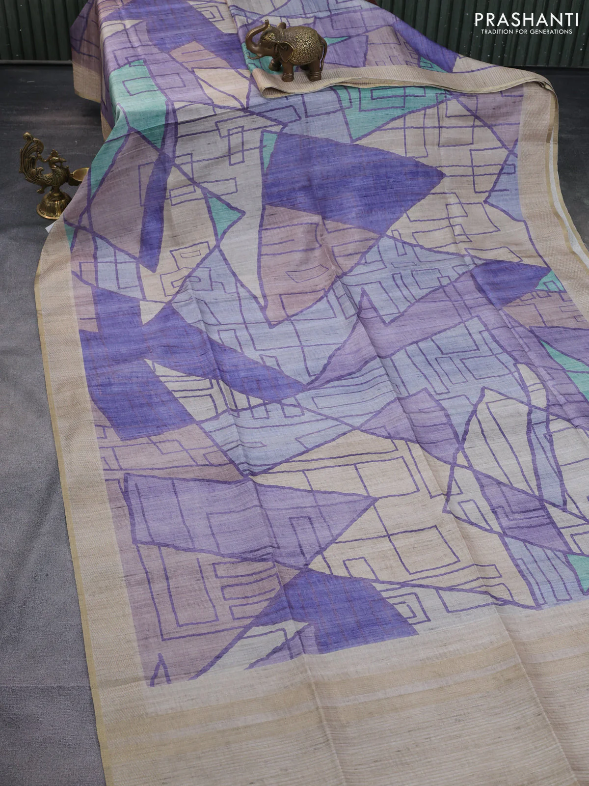 Semi matka saree multi colour and beige with allover geometric prints and zari woven border