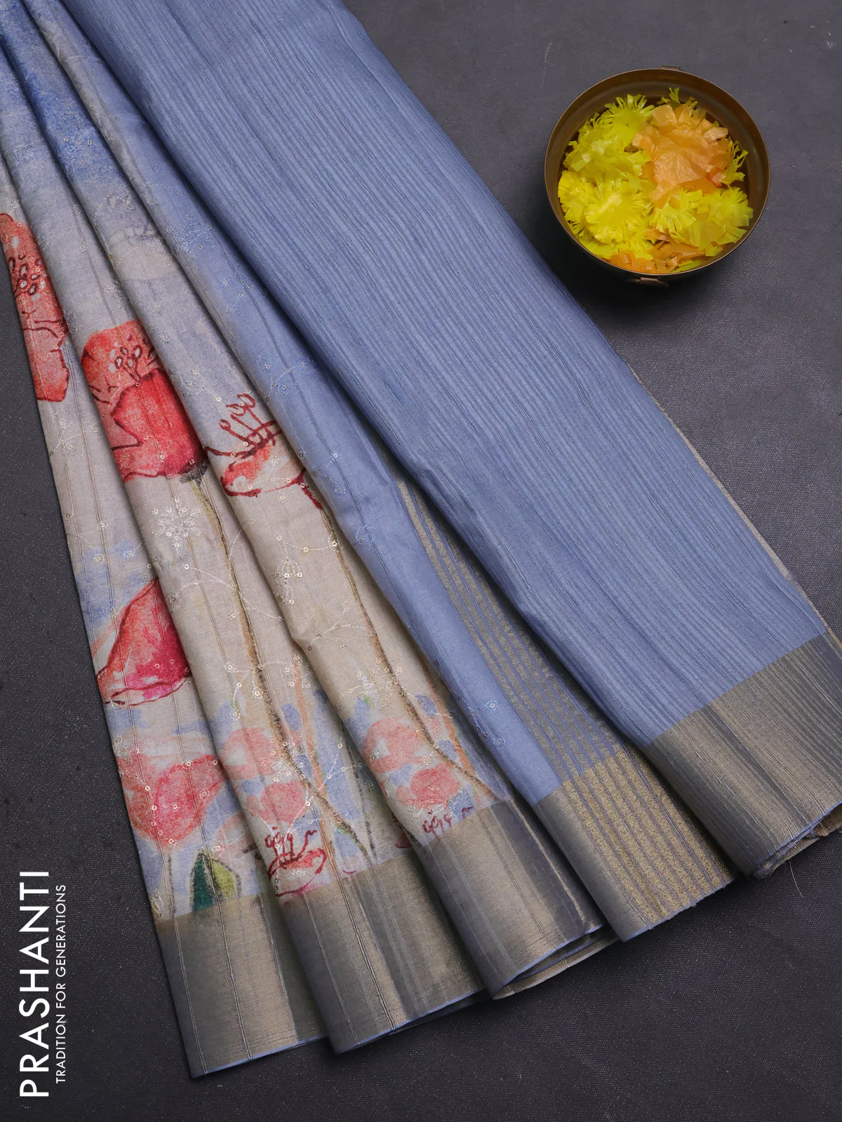 Semi matka saree pasel blue with allover floral prints & sequence work and zari woven border