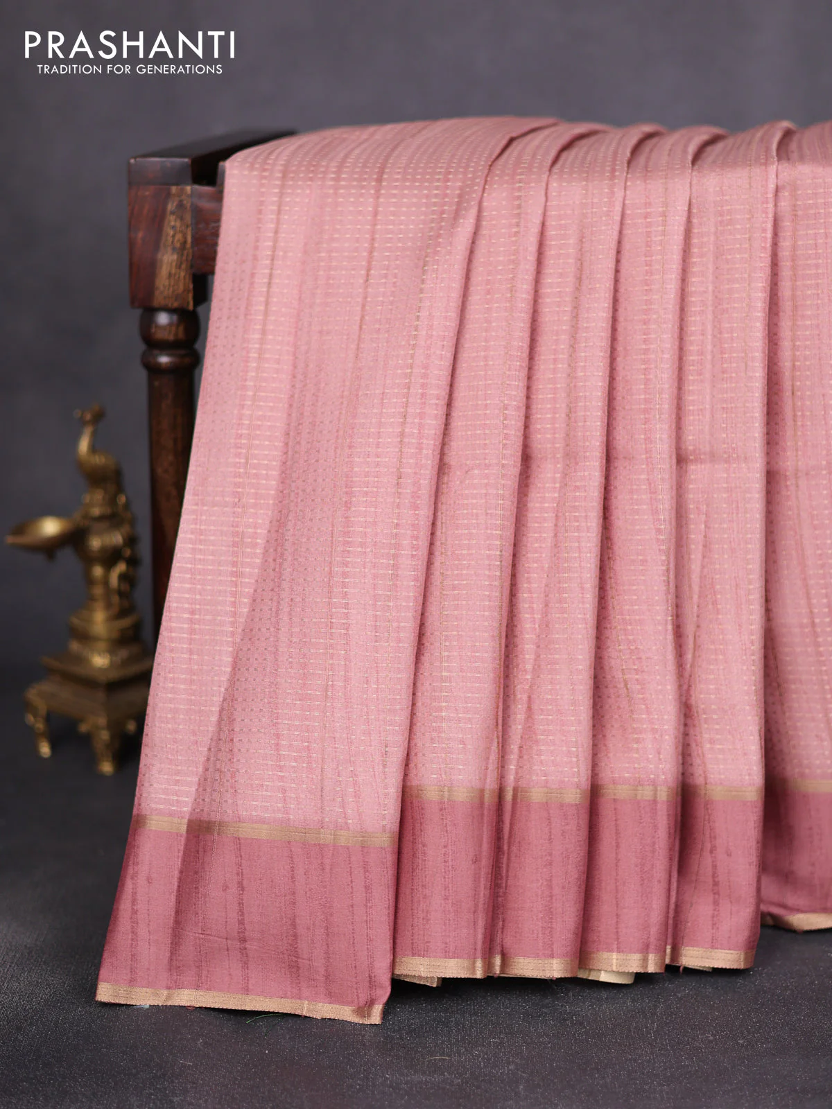Semi matka saree pastel peach with allover zari weaves and rettapet zari woven border
