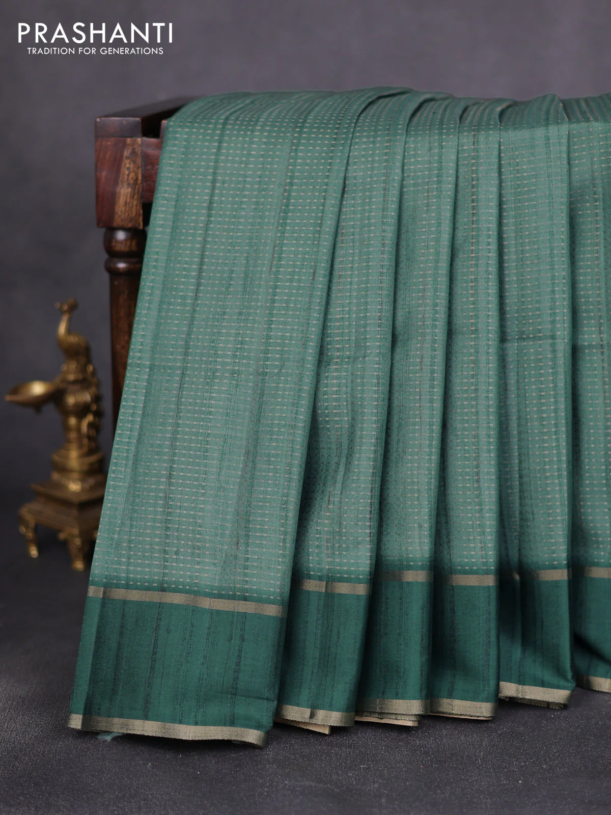 Semi matka saree peacock green with allover zari weaves and rettapet zari woven border