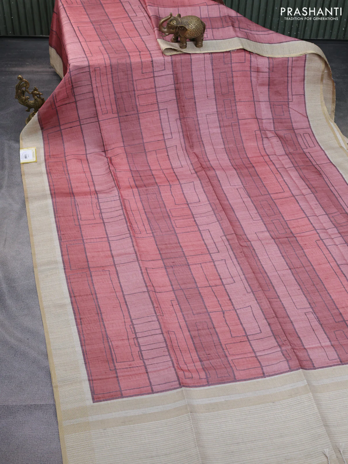 Semi matka saree rust shade and beige with allover geometric prints and zari woven border